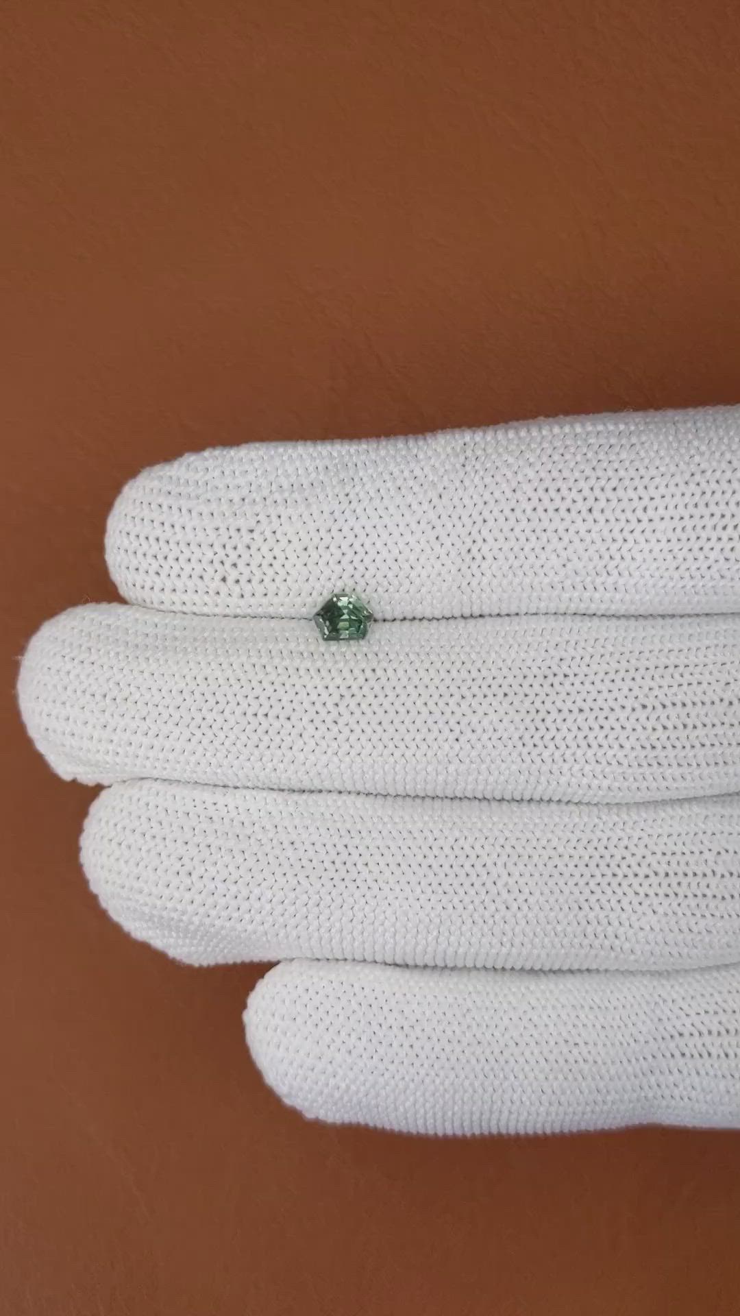 0.56 Ct. Bluish Green Sapphire from Madagascar Size Video