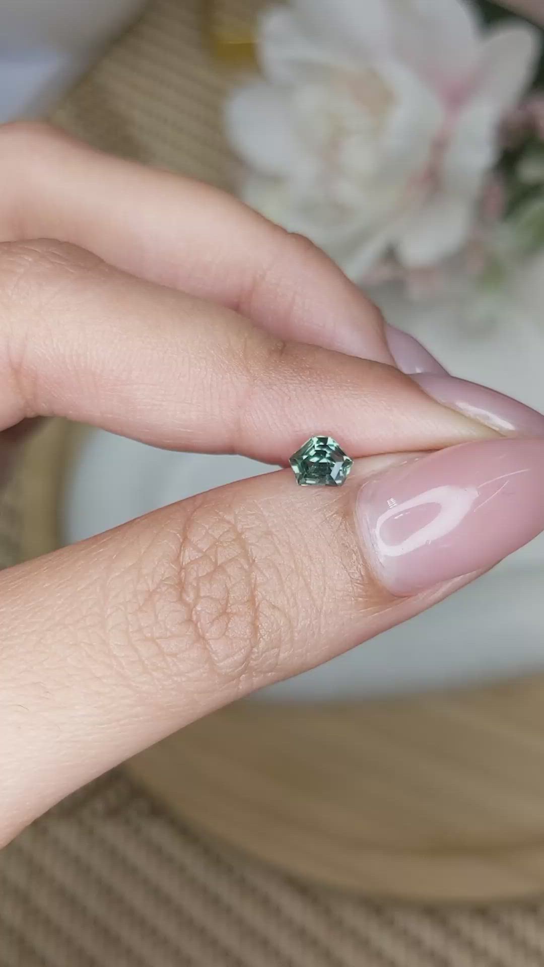 0.56 Ct. Bluish Green Sapphire from Madagascar Size Video