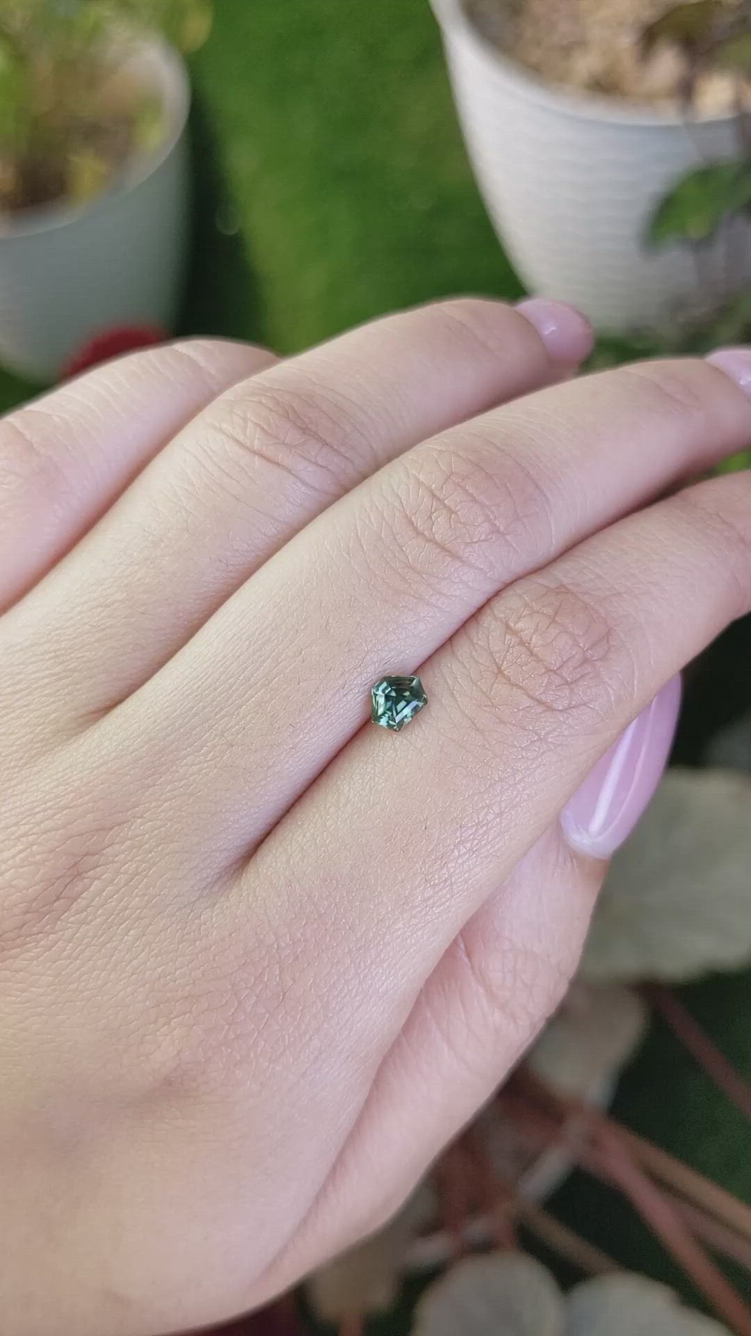0.56 Ct. Bluish Green Sapphire from Madagascar Size Video