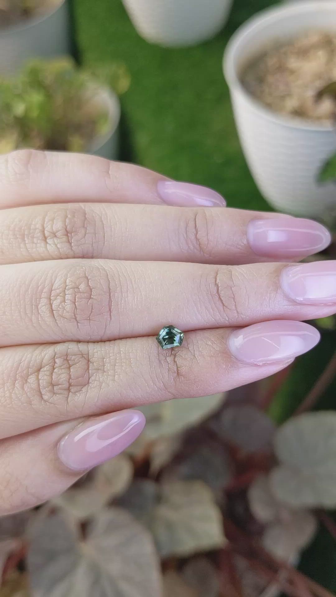 0.56 Ct. Bluish Green Sapphire from Madagascar Size Video