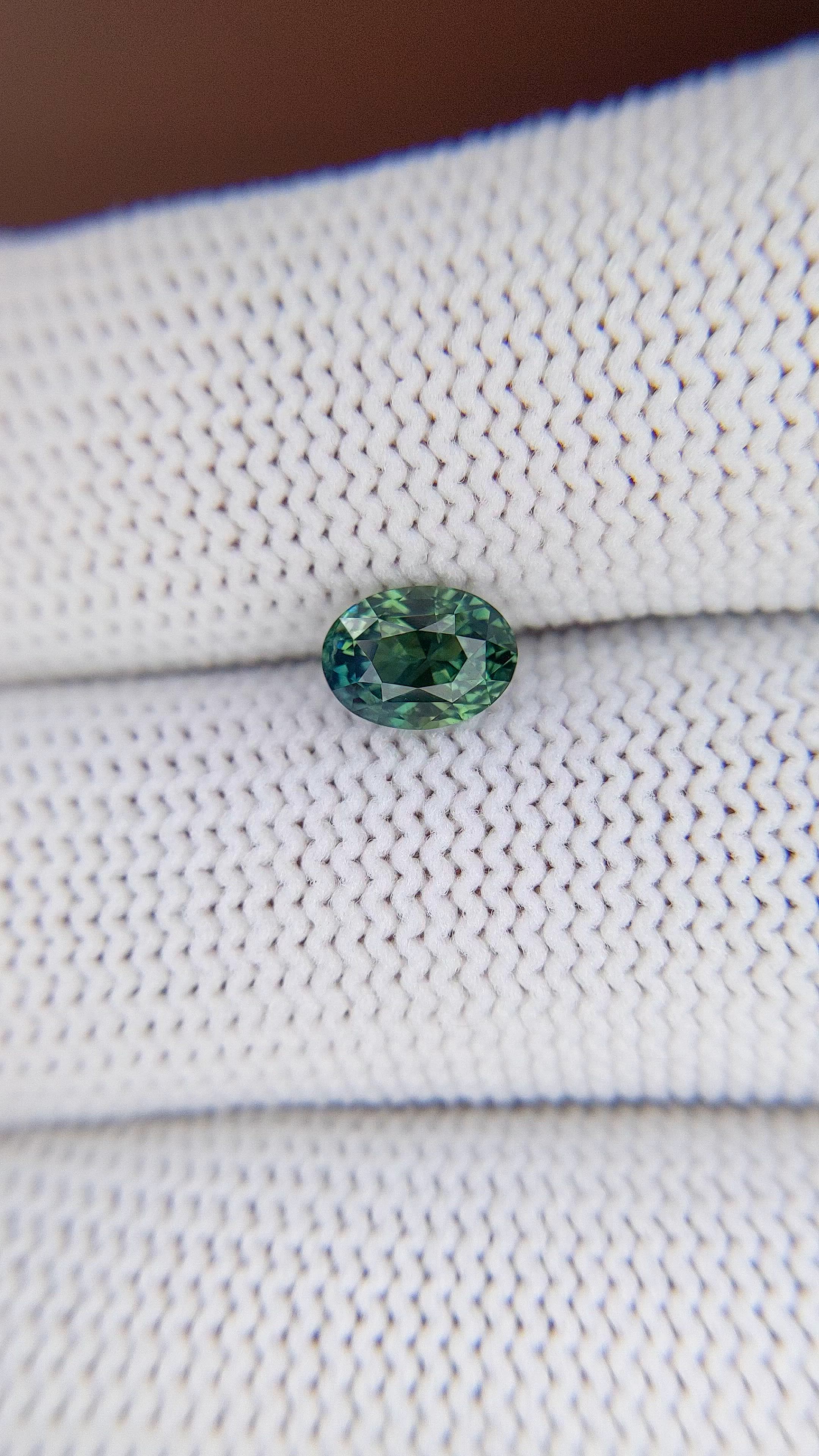 1.27 Ct. Bluish Green Sapphire from Madagascar Size Video