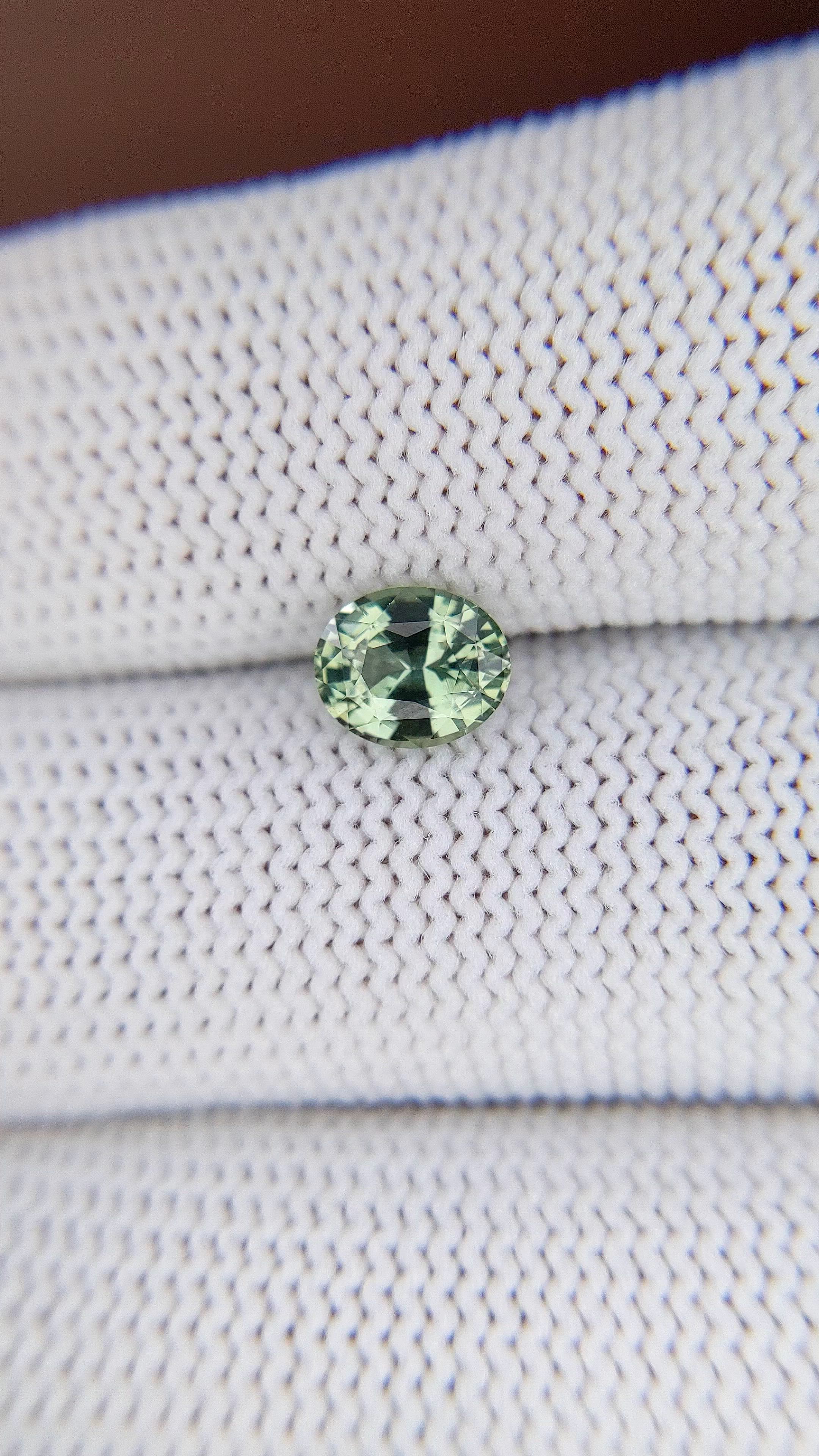 1.31 Ct. Bluish Green Sapphire from Madagascar Size Video