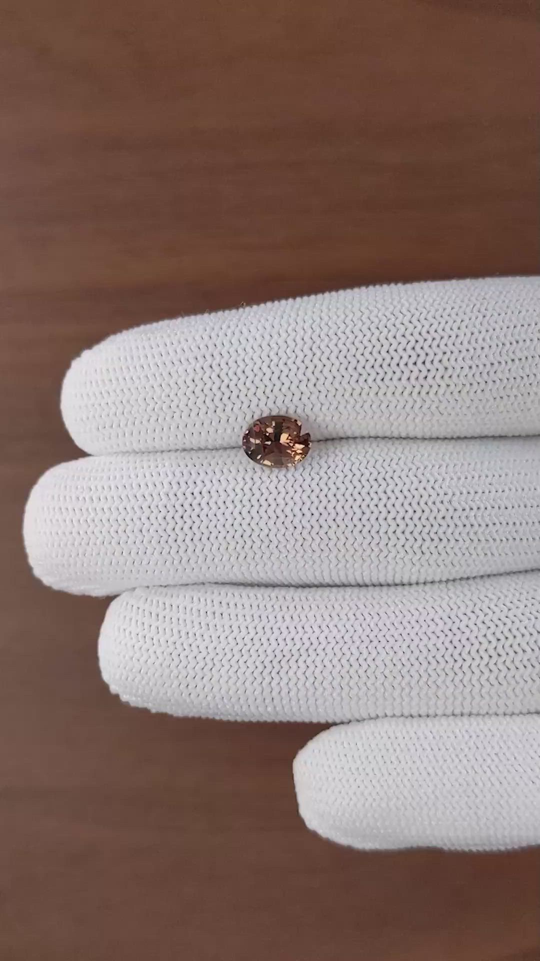 1.75 Ct. Pinkish Brown Sapphire from Madagascar Size Video