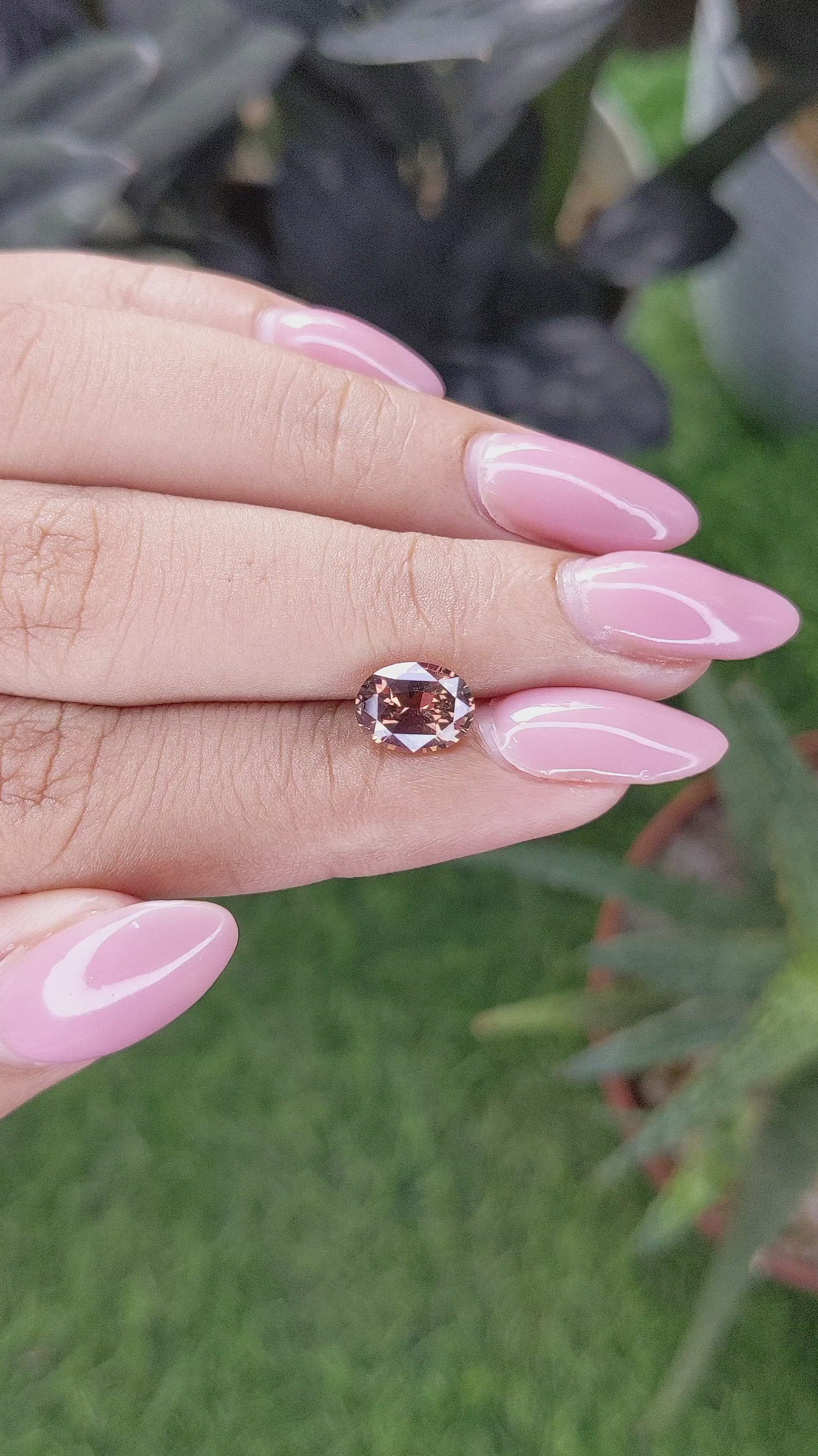 1.75 Ct. Pinkish Brown Sapphire from Madagascar Size Video