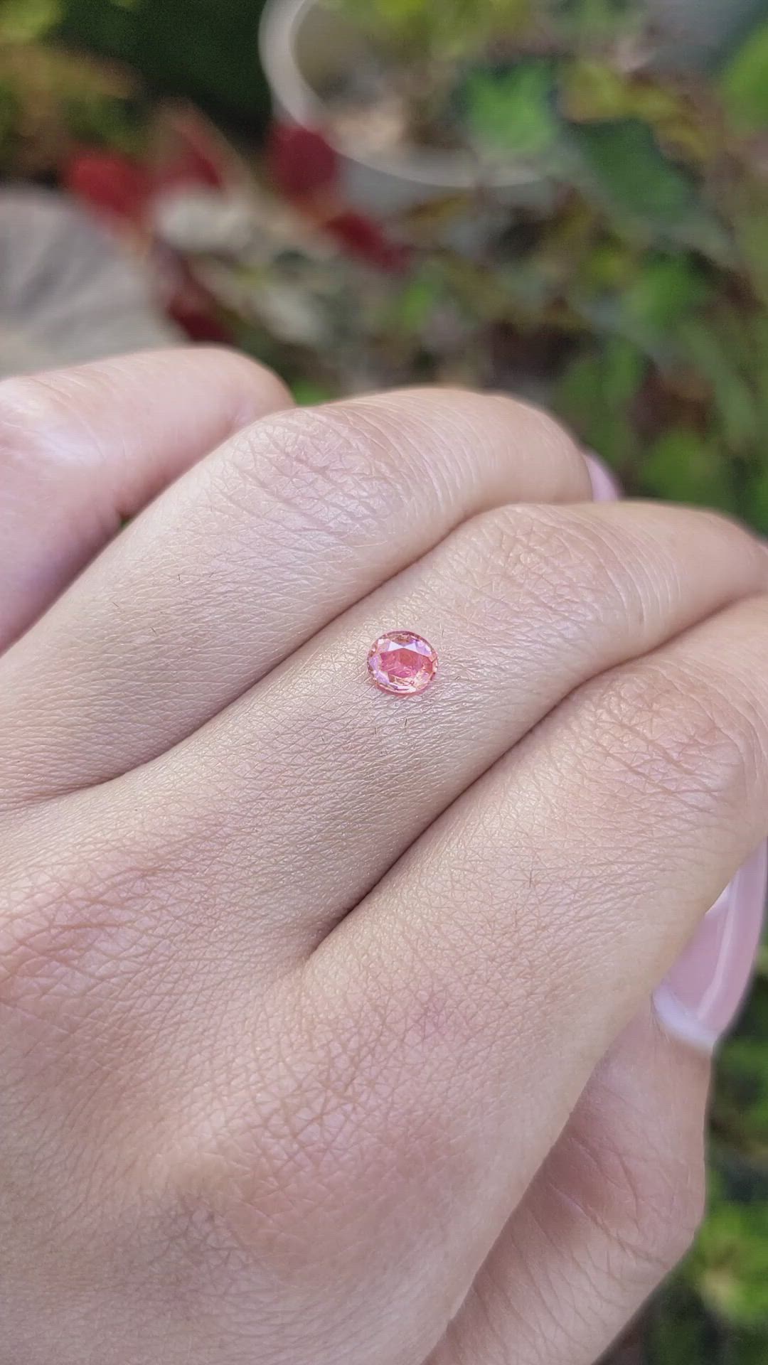 0.39 Ct. Peach Sapphire from Ceylon (Sri Lanka) Size Video