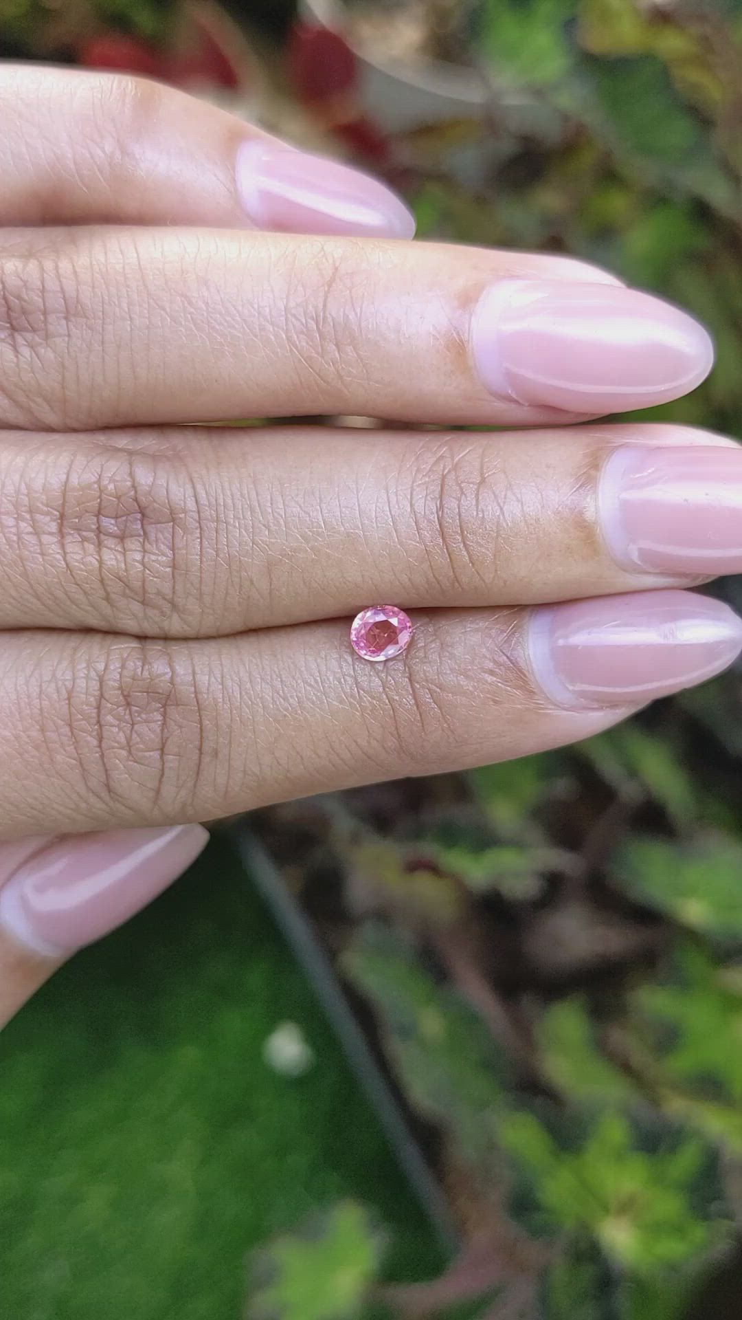 0.39 Ct. Peach Sapphire from Ceylon (Sri Lanka) Size Video