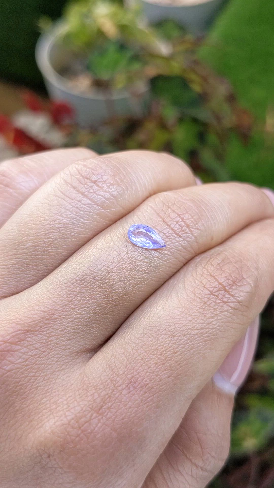 0.59 Ct. Violet Sapphire from Ceylon (Sri Lanka) Size Video