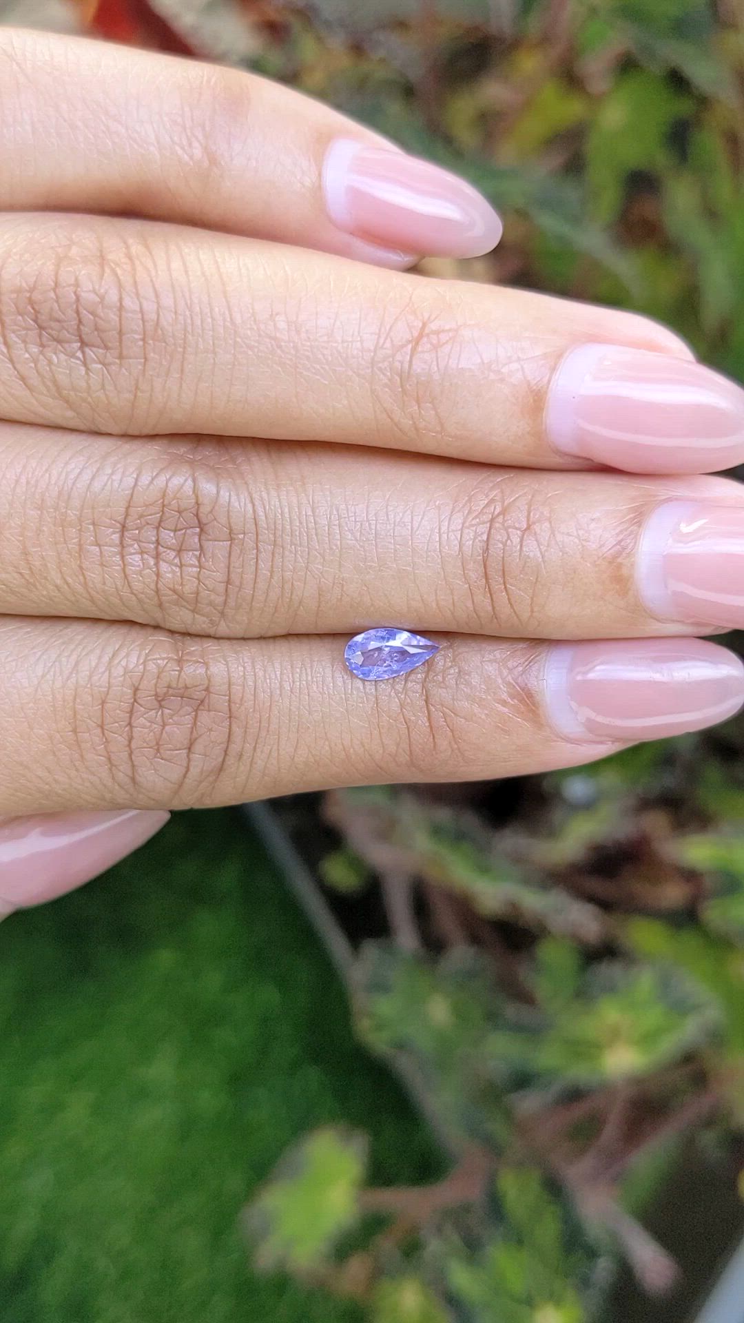0.59 Ct. Violet Sapphire from Ceylon (Sri Lanka) Size Video