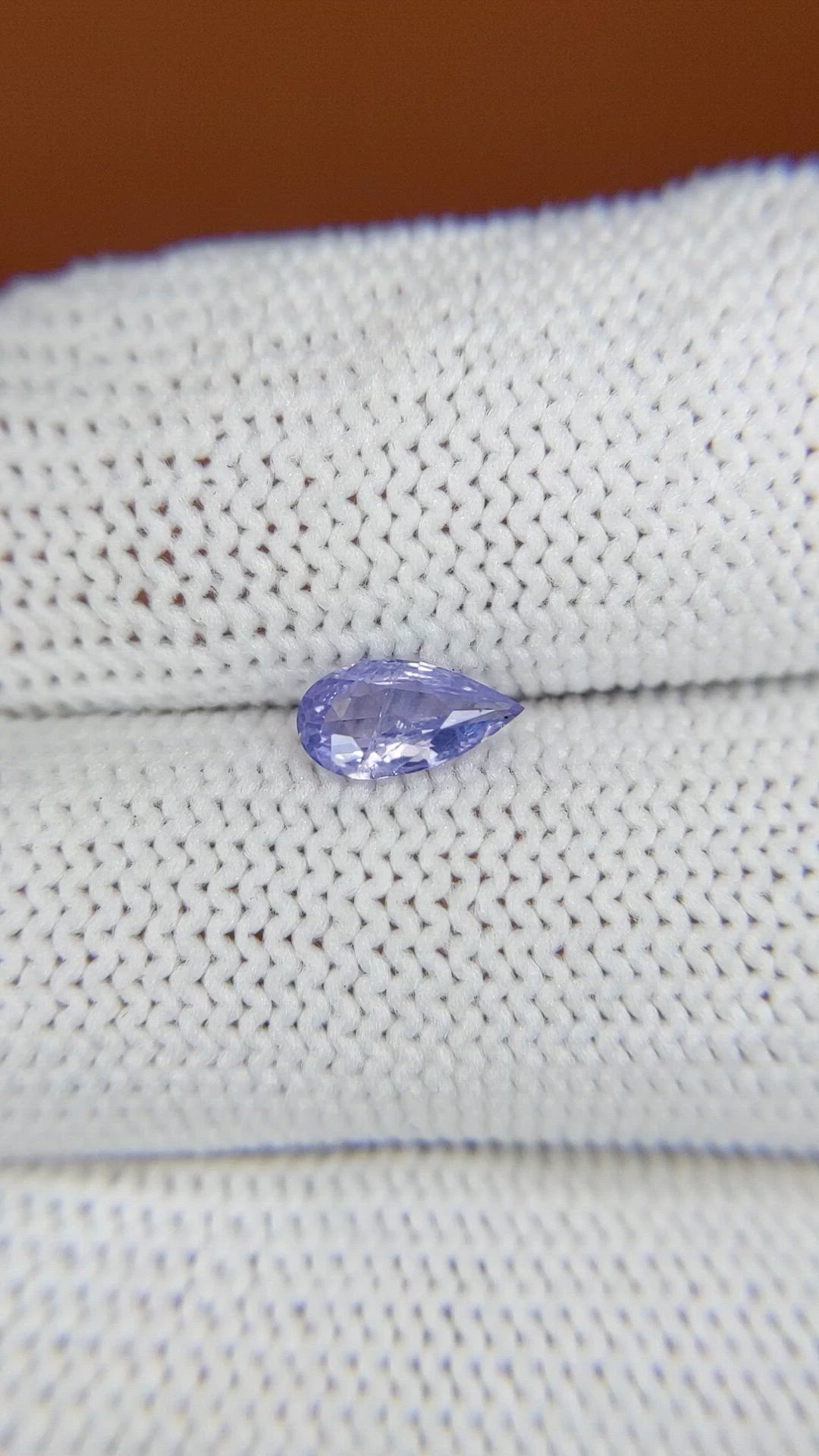 0.59 Ct. Violet Sapphire from Ceylon (Sri Lanka) Size Video