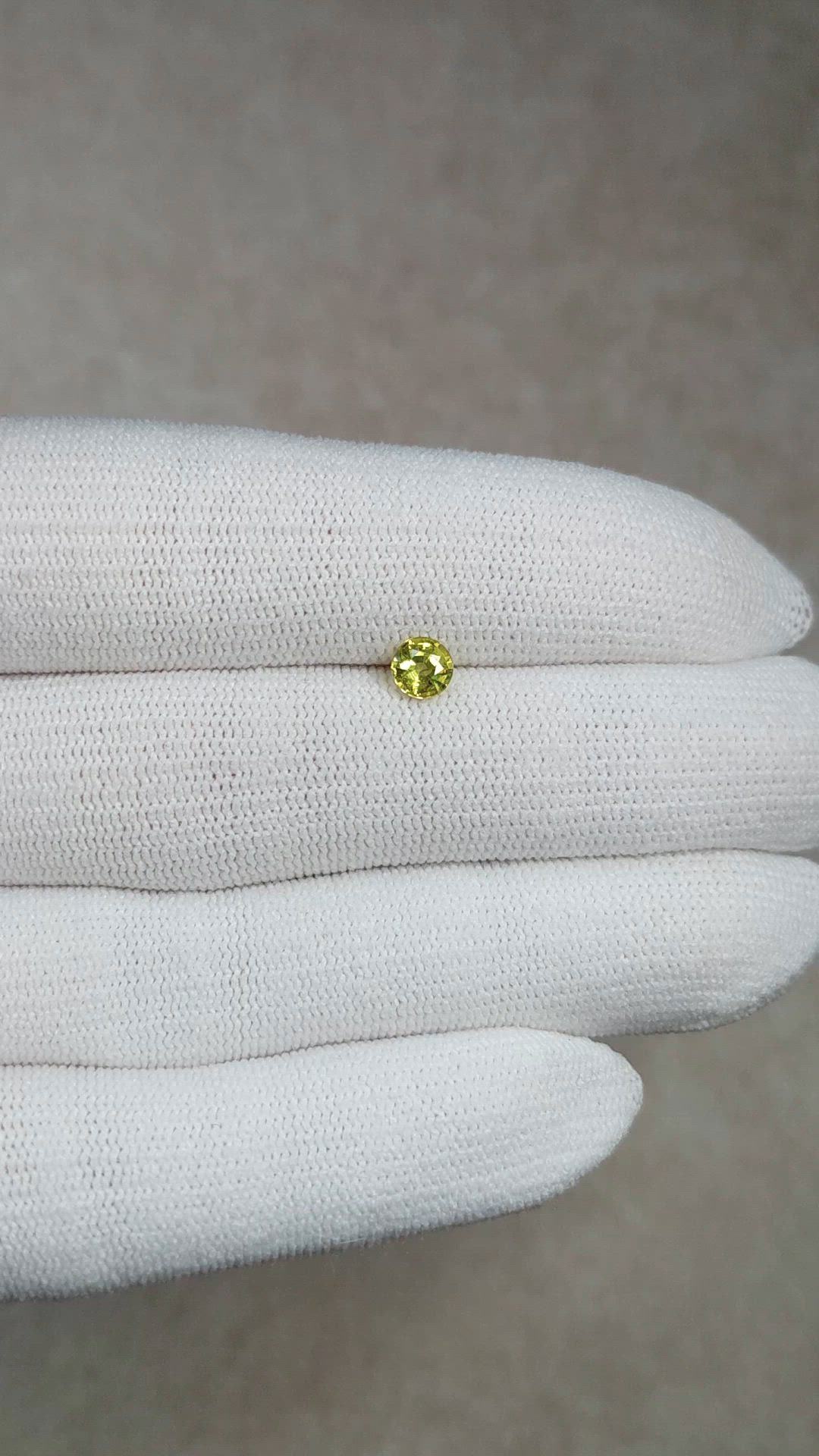 0.59 Ct. Greenish Yellow Sapphire from Ceylon (Sri Lanka) Size Video
