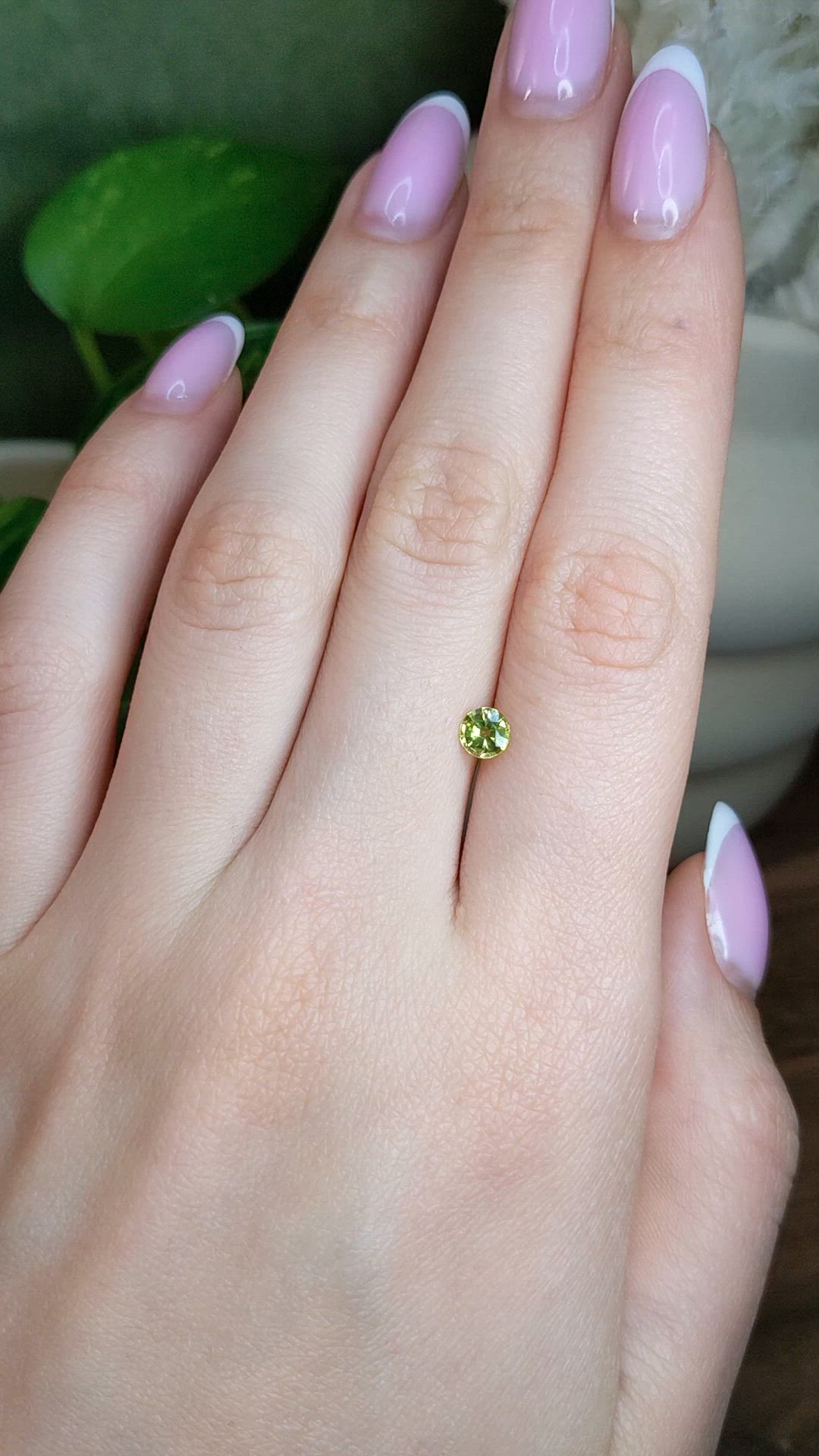 0.59 Ct. Greenish Yellow Sapphire from Ceylon (Sri Lanka) Size Video