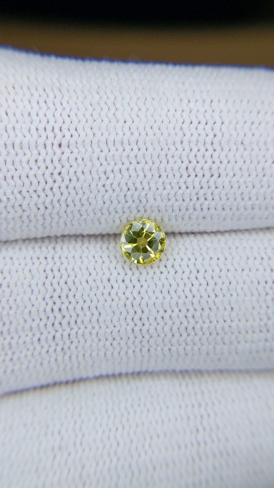 0.59 Ct. Greenish Yellow Sapphire from Ceylon (Sri Lanka) Size Video