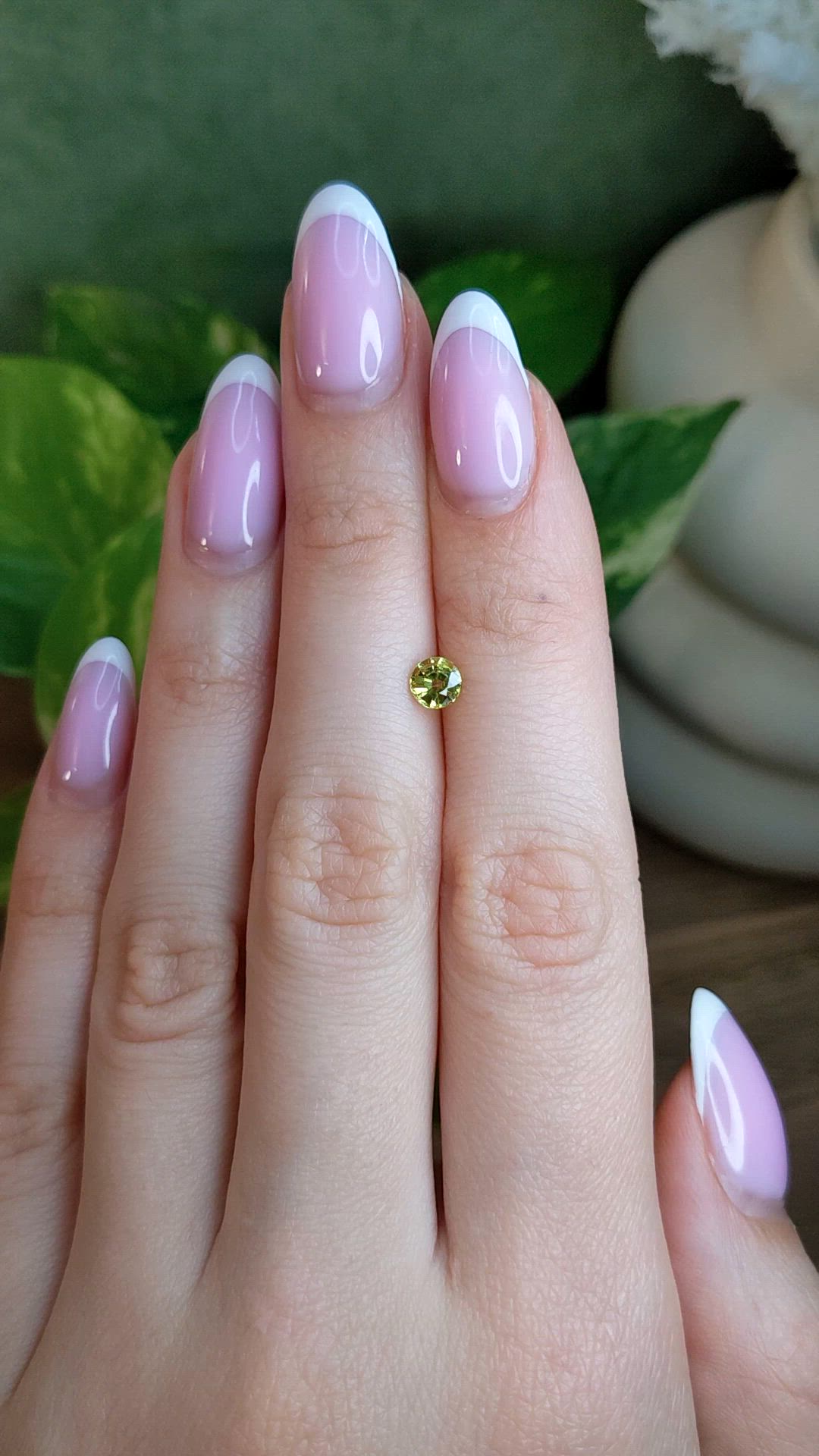 0.59 Ct. Greenish Yellow Sapphire from Ceylon (Sri Lanka) Size Video