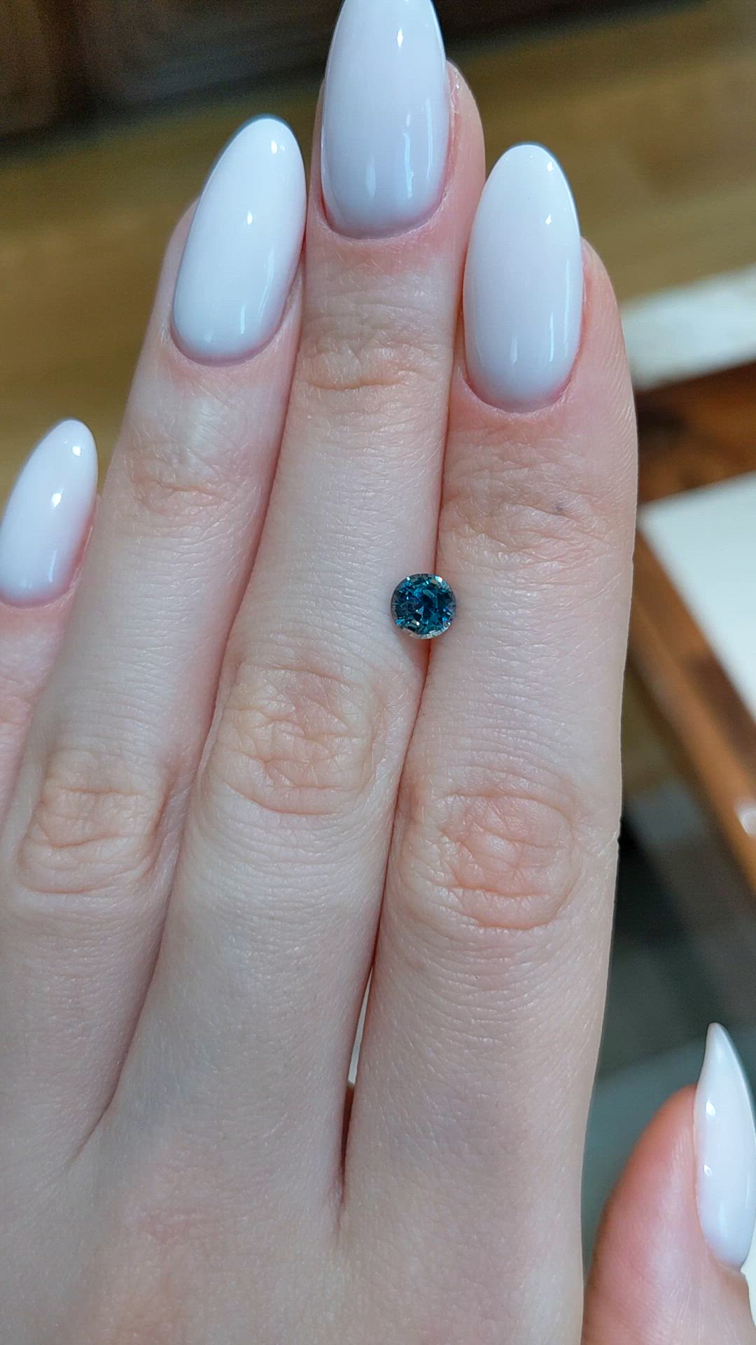0.93 Ct. Greenish Blue Sapphire from Montana Size Video