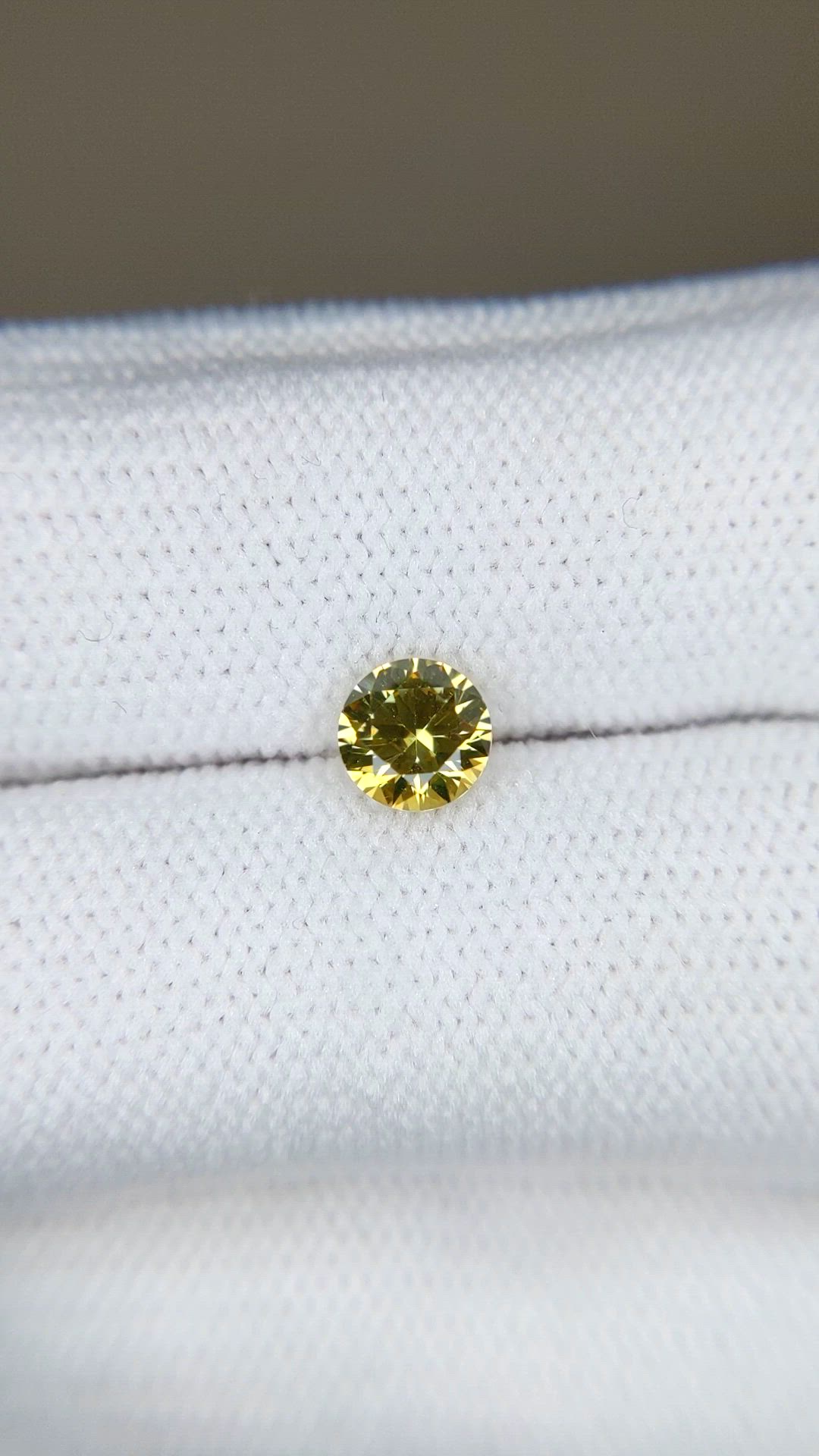 0.72 Ct. Yellow Sapphire from Montana Size Video