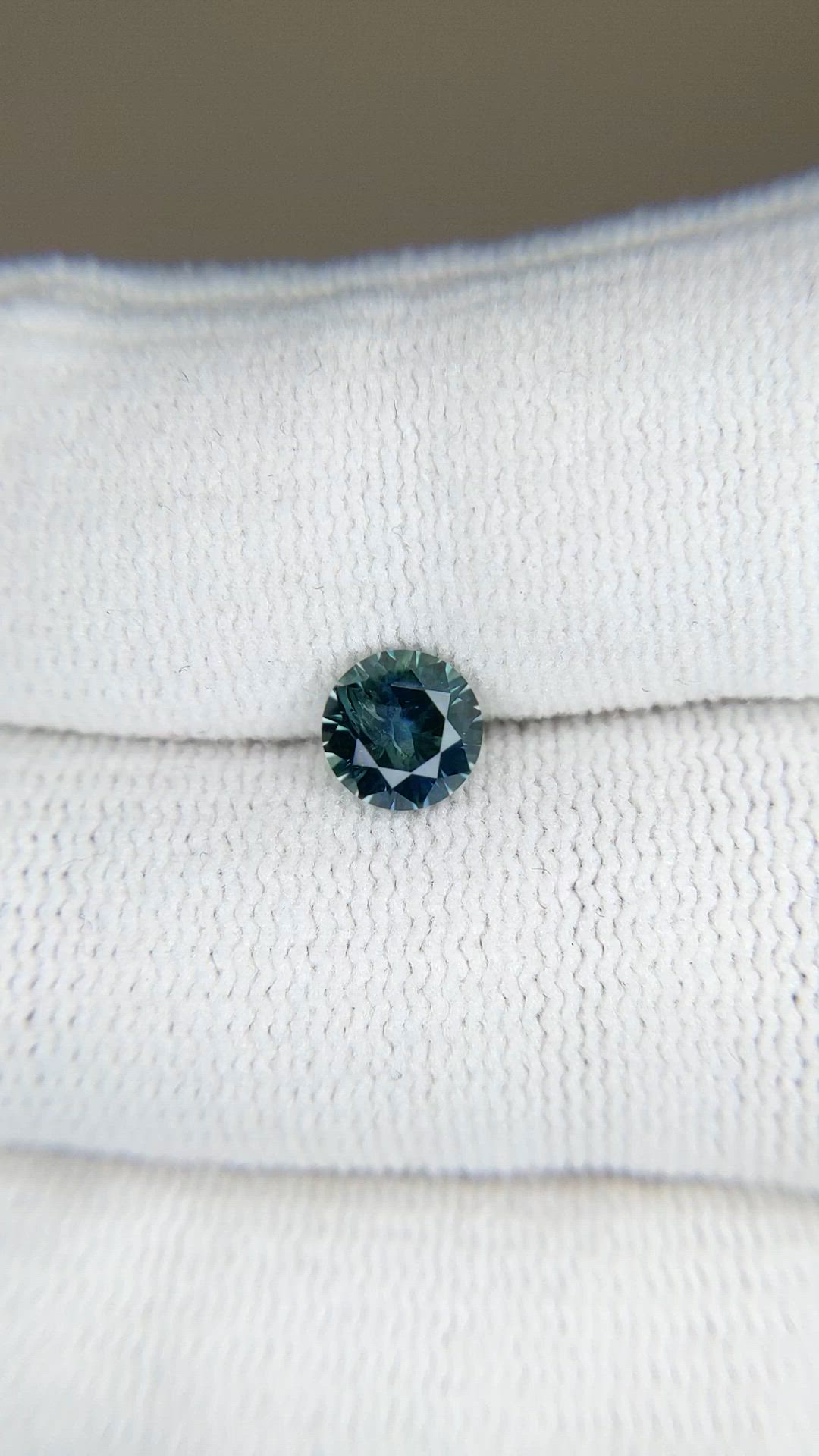 0.96 Ct. Bluish Green Sapphire from Montana Size Video