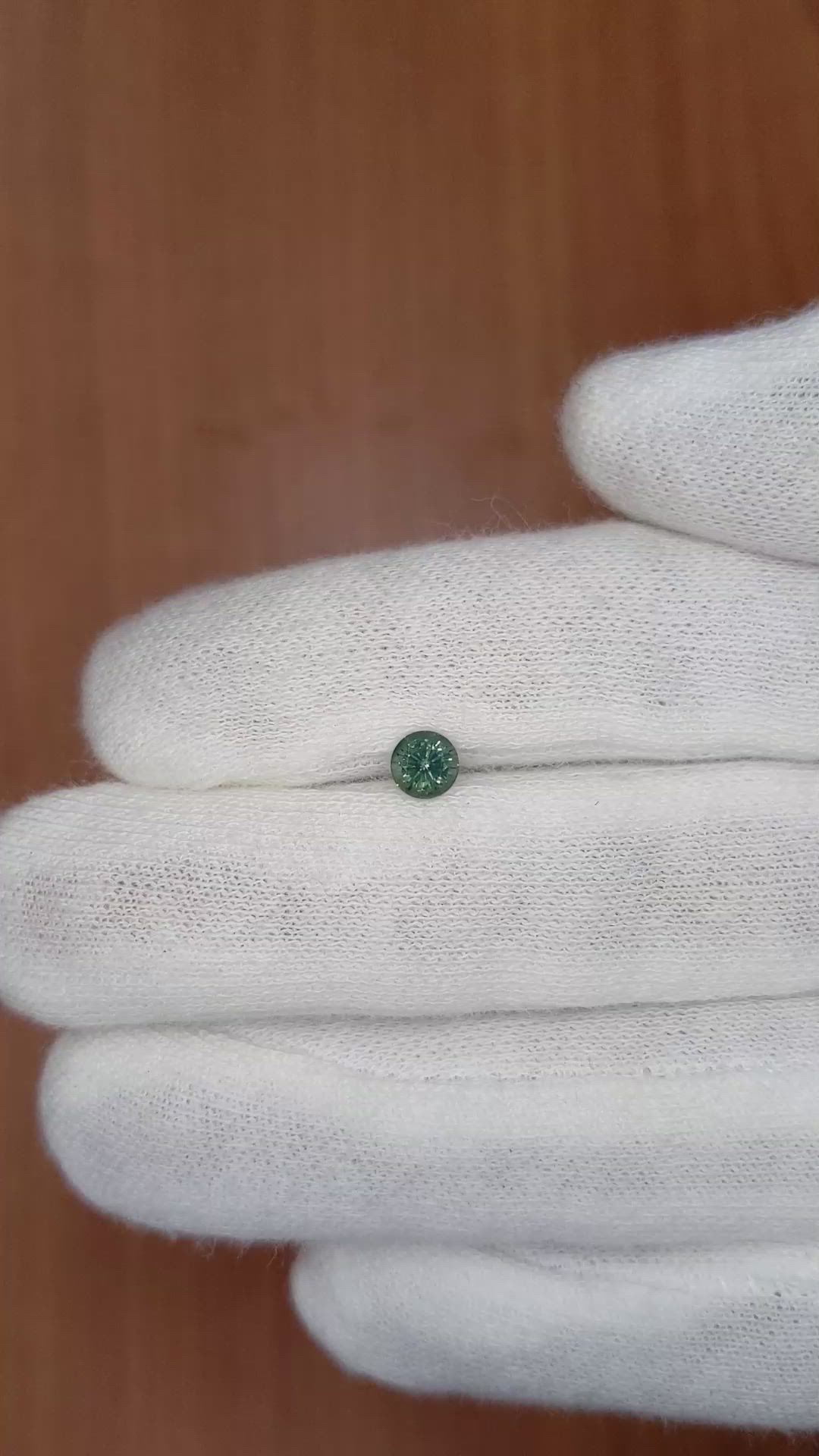 0.62 Ct. Bluish Green Sapphire from Madagascar Size Video
