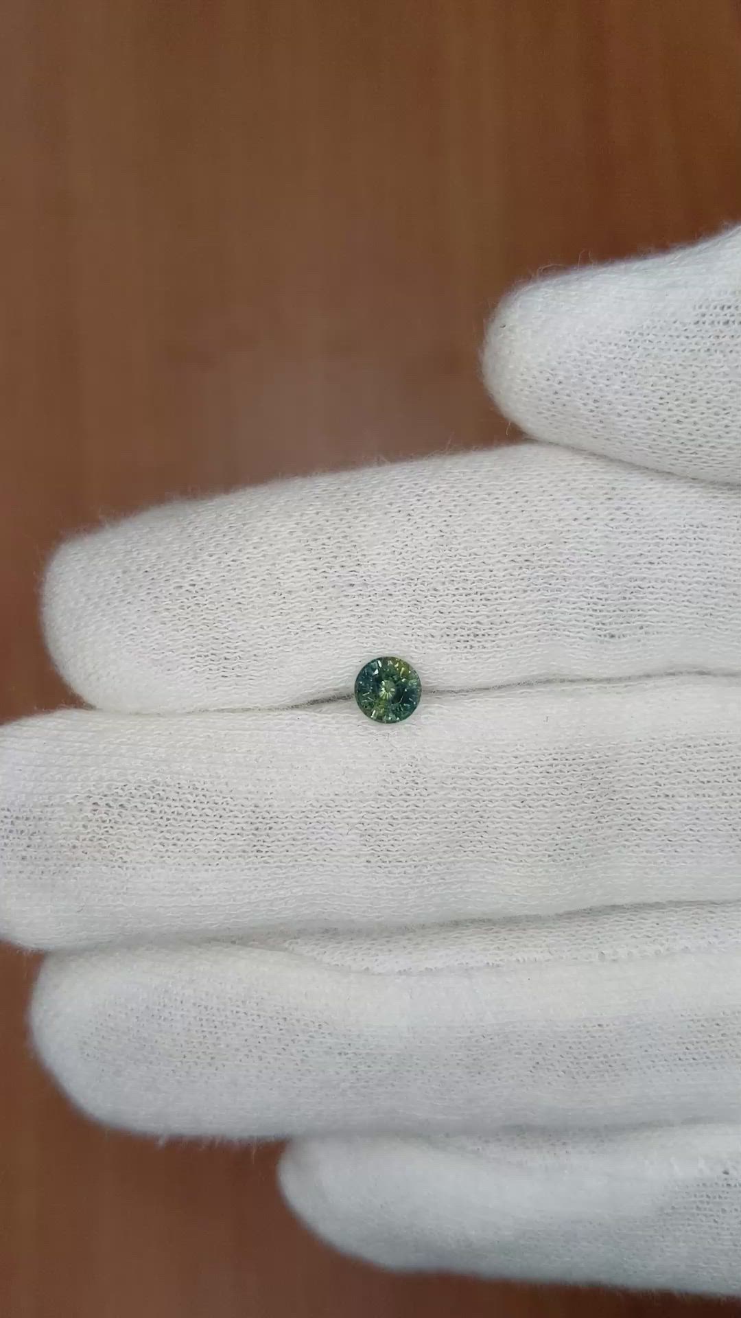 0.56 Ct. Bluish Green Sapphire from Madagascar Size Video