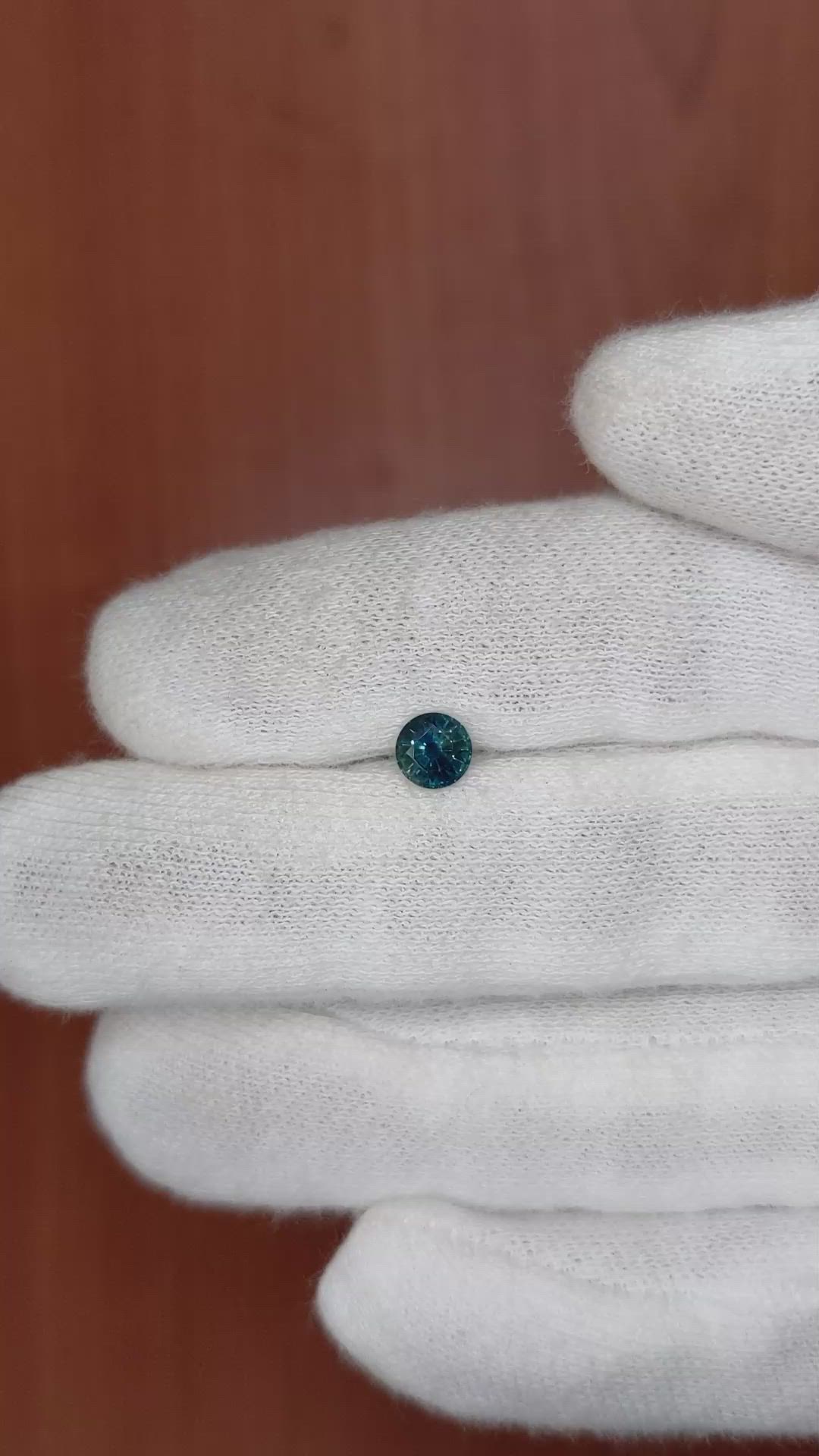 0.65 Ct. Greenish Blue Sapphire from Madagascar Size Video