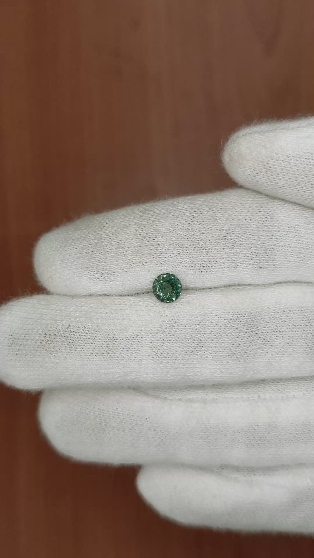 0.66 Ct. Bluish Green Sapphire from Madagascar Size Video