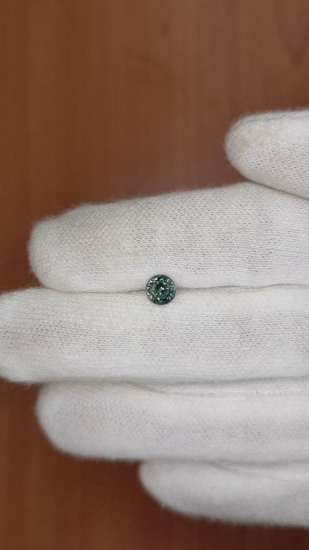 0.77 Ct. Bluish Green Sapphire from Madagascar Size Video