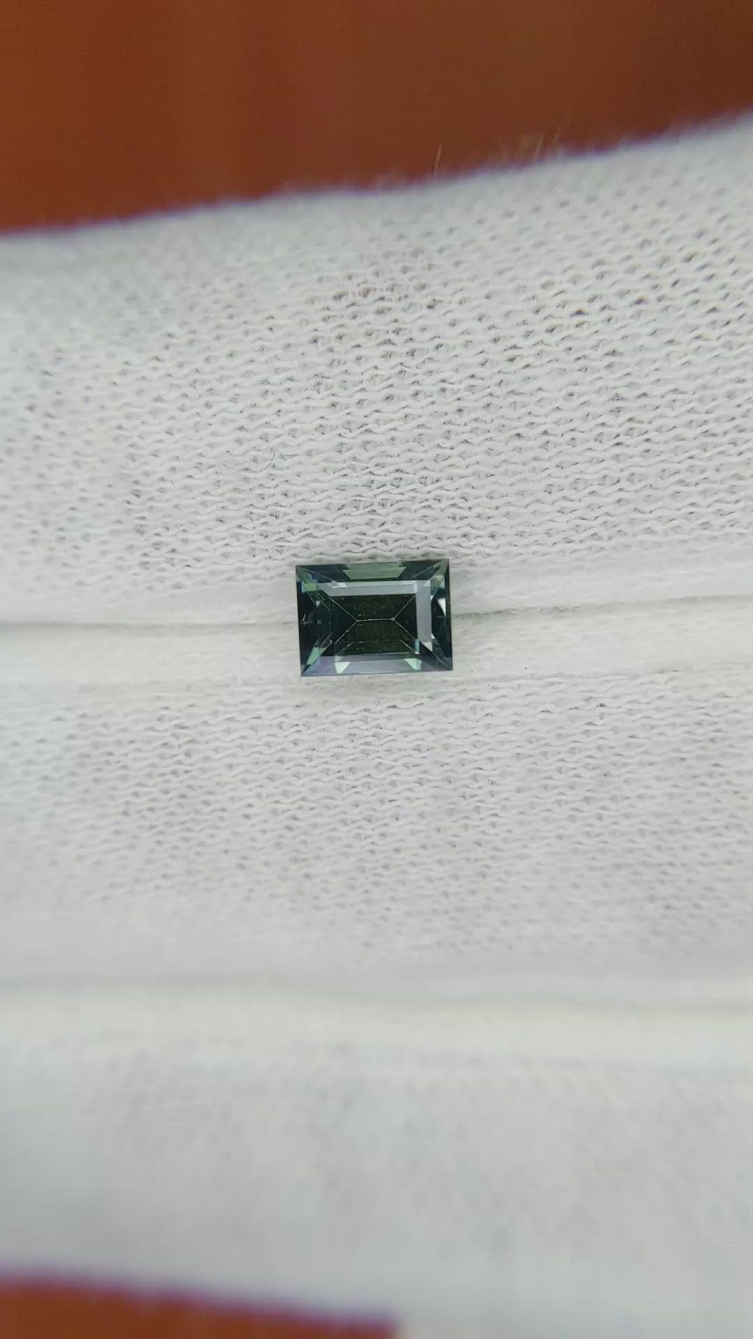 0.93 Ct. Bluish Green Sapphire from Madagascar Size Video