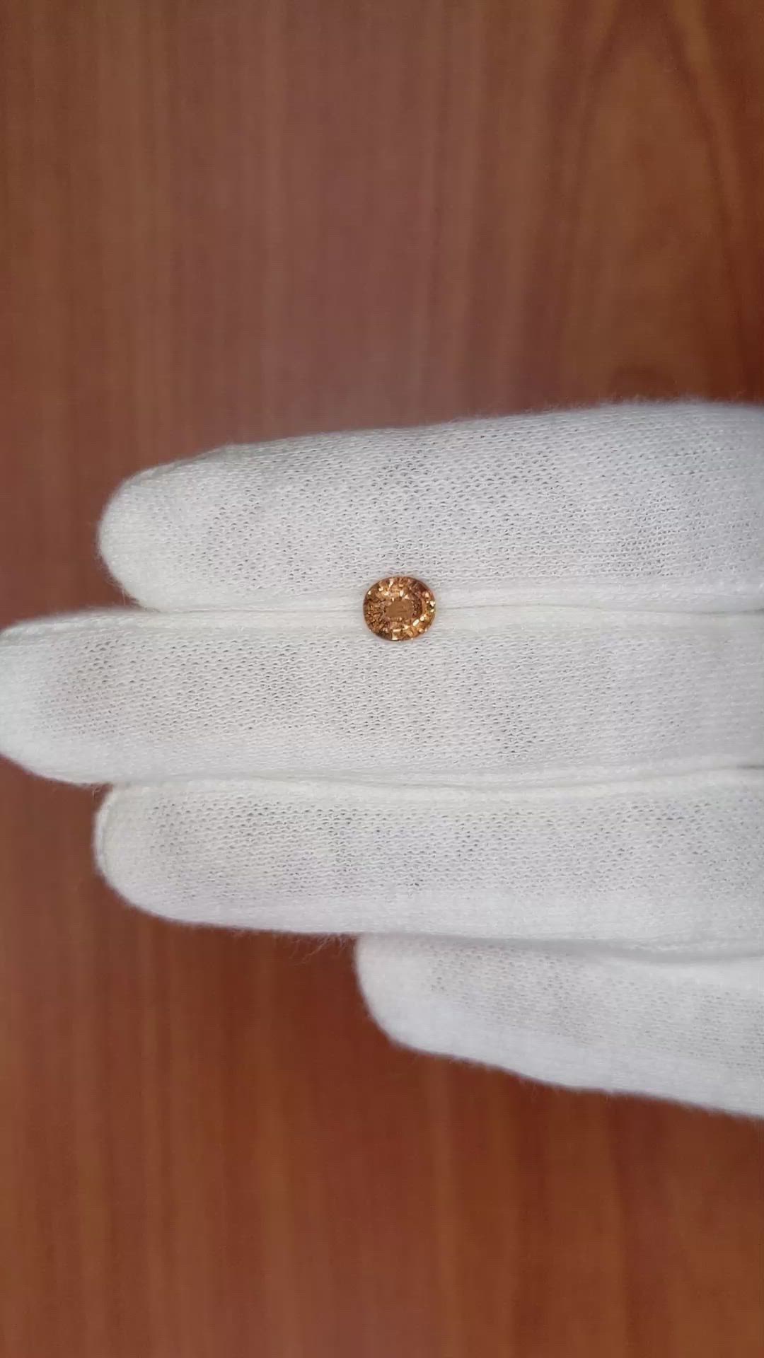 1.03 Ct. Orangish Brown Sapphire from Madagascar Size Video