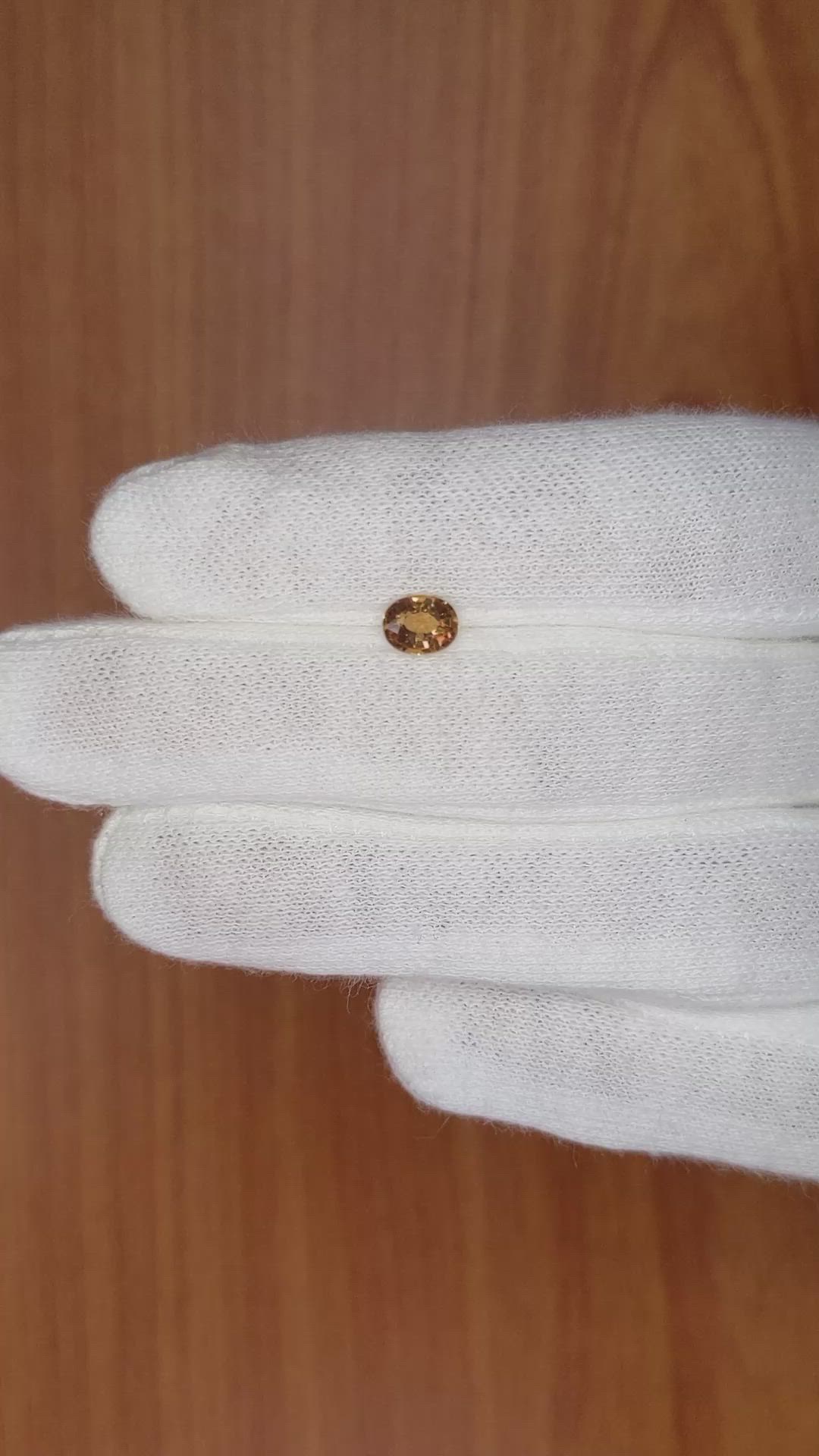0.76 Ct. Yellowish Brown Sapphire from Madagascar Size Video