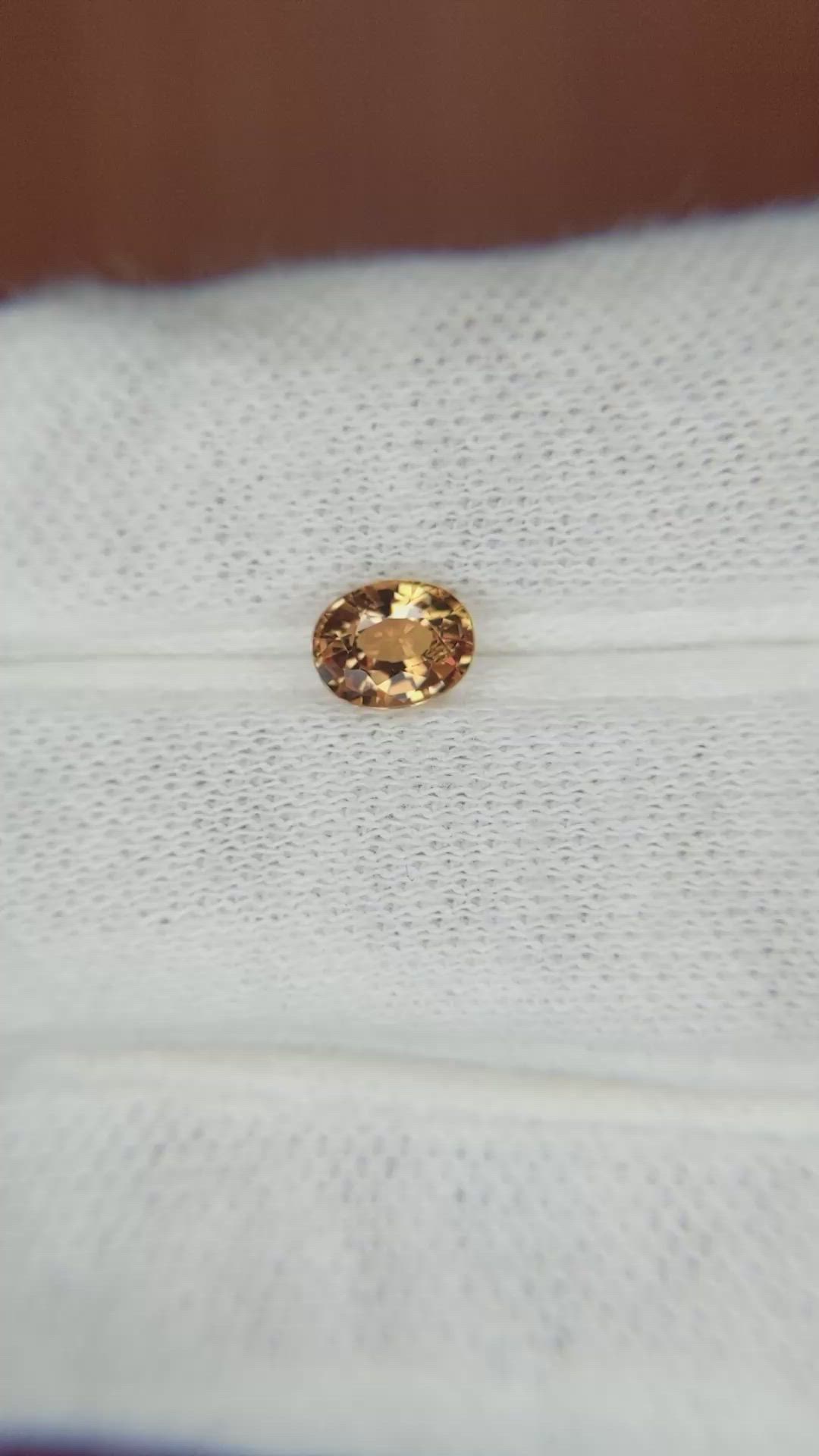 0.76 Ct. Yellowish Brown Sapphire from Madagascar Size Video
