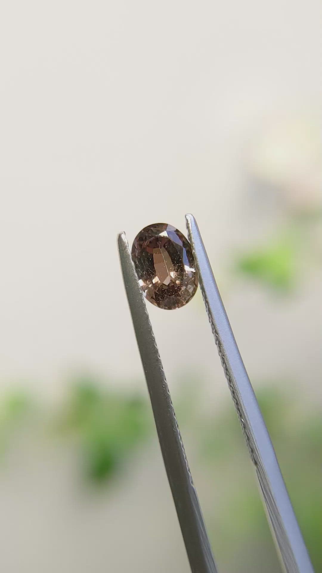 0.91 Ct. Greenish Brown Sapphire from Madagascar Size Video