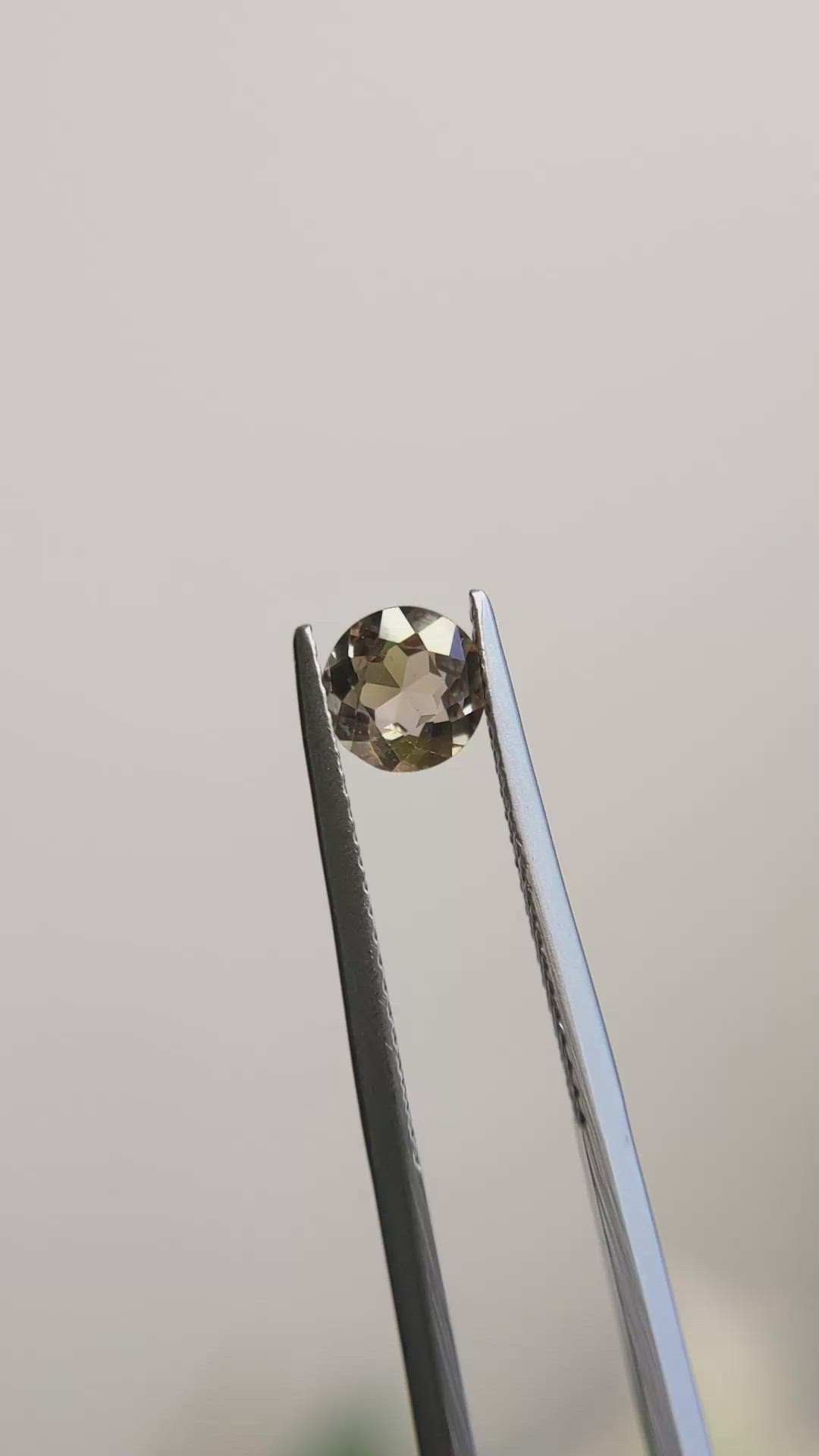 0.84 Ct. Greenish Brown Sapphire from Madagascar Size Video