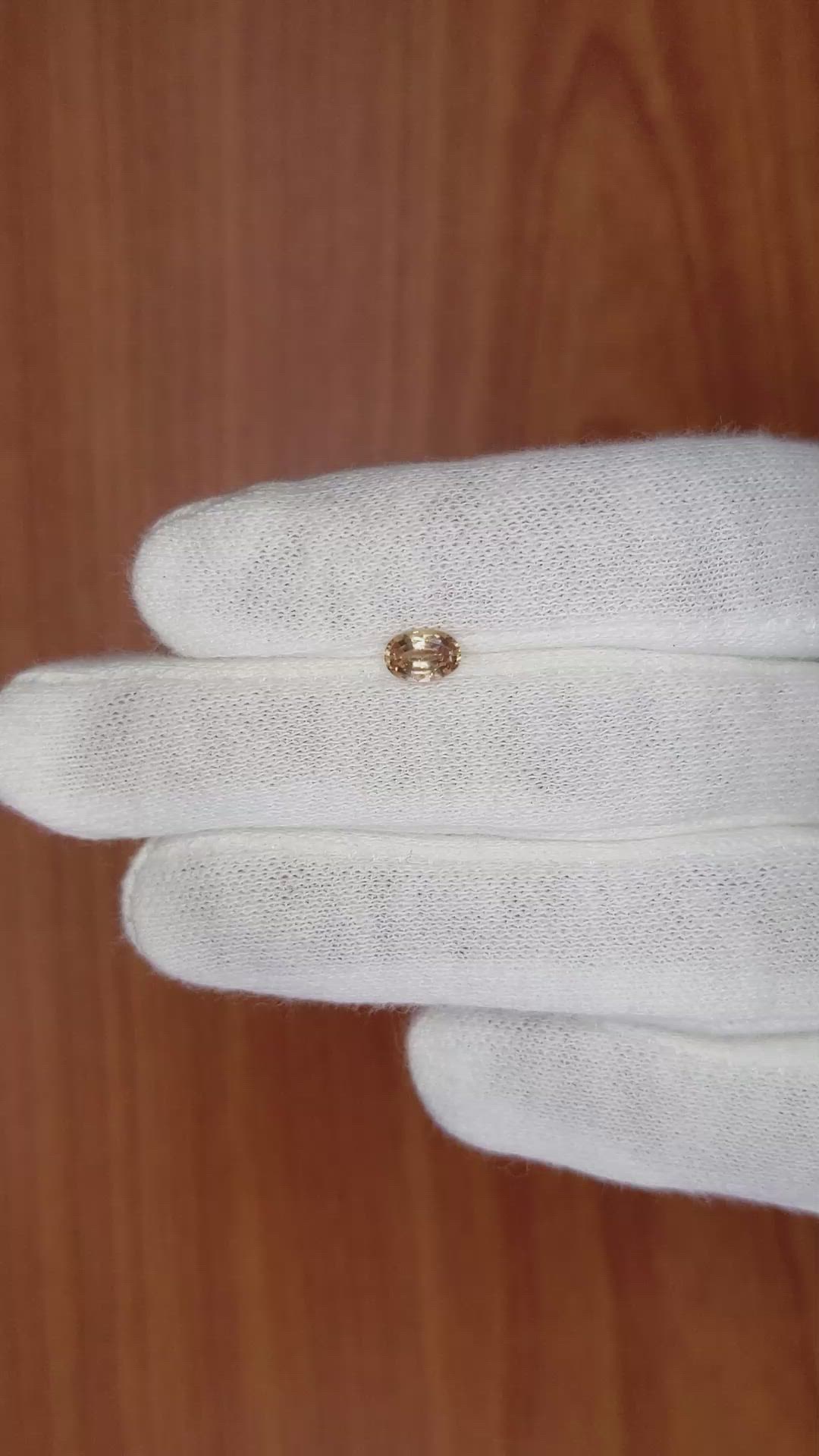 0.61 Ct. Brown Sapphire from Madagascar Size Video