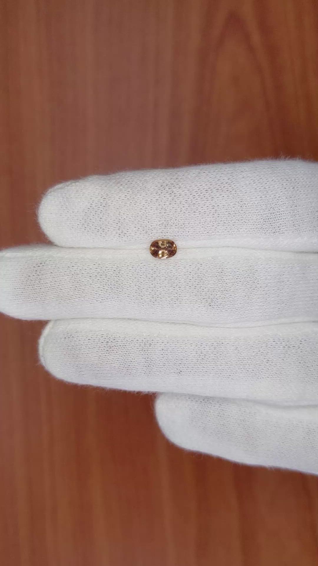 0.44 Ct. Orangish Brown Sapphire from Madagascar Size Video