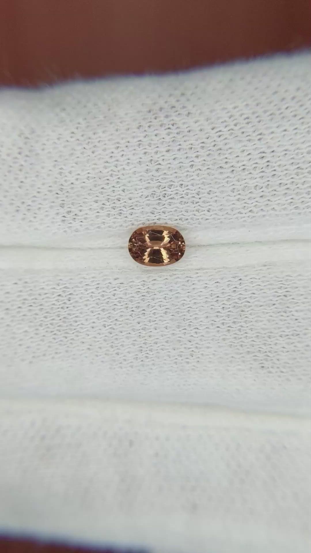 0.44 Ct. Orangish Brown Sapphire from Madagascar Size Video