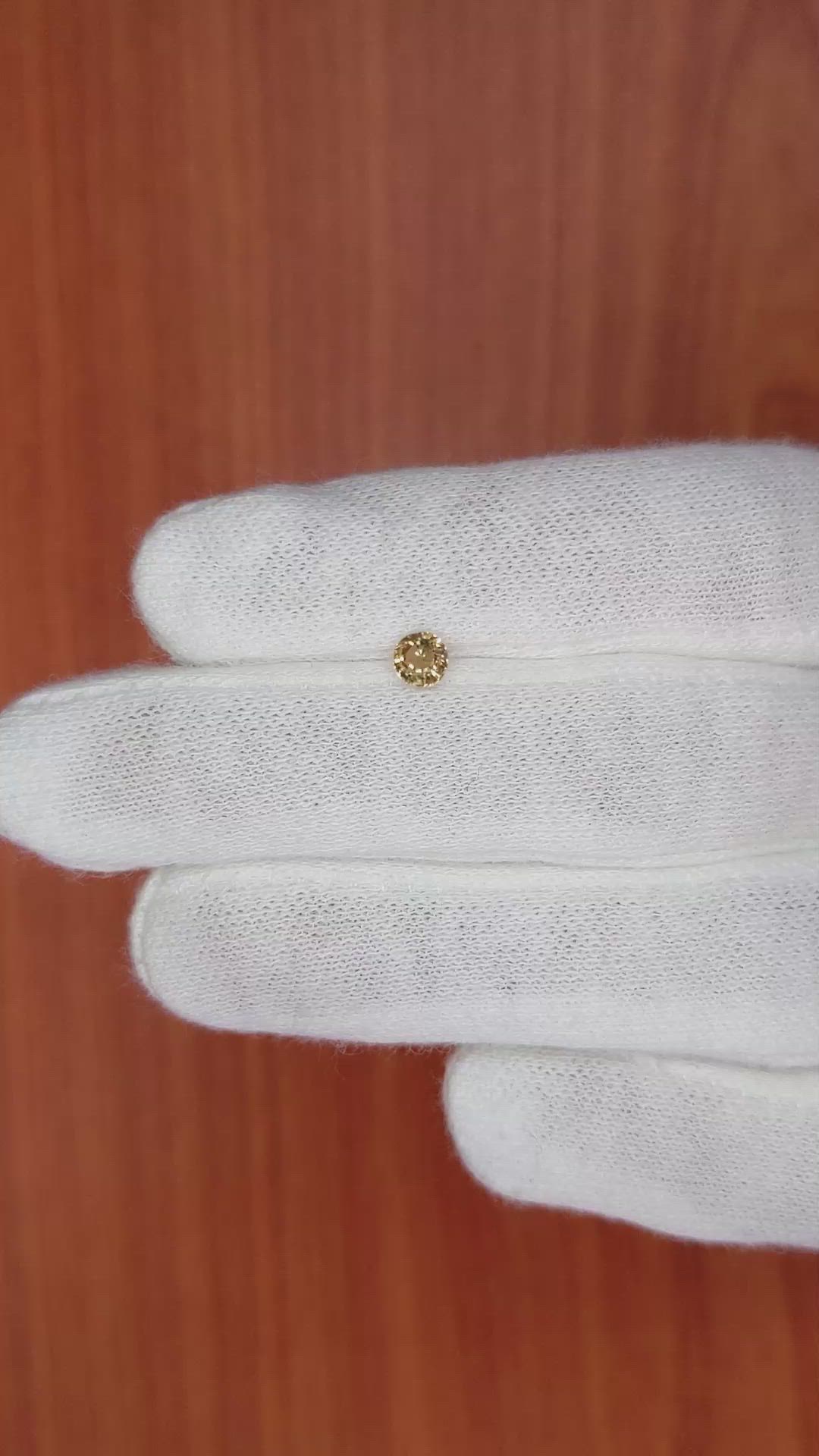 0.37 Ct. Greenish Brown Sapphire from Madagascar Size Video