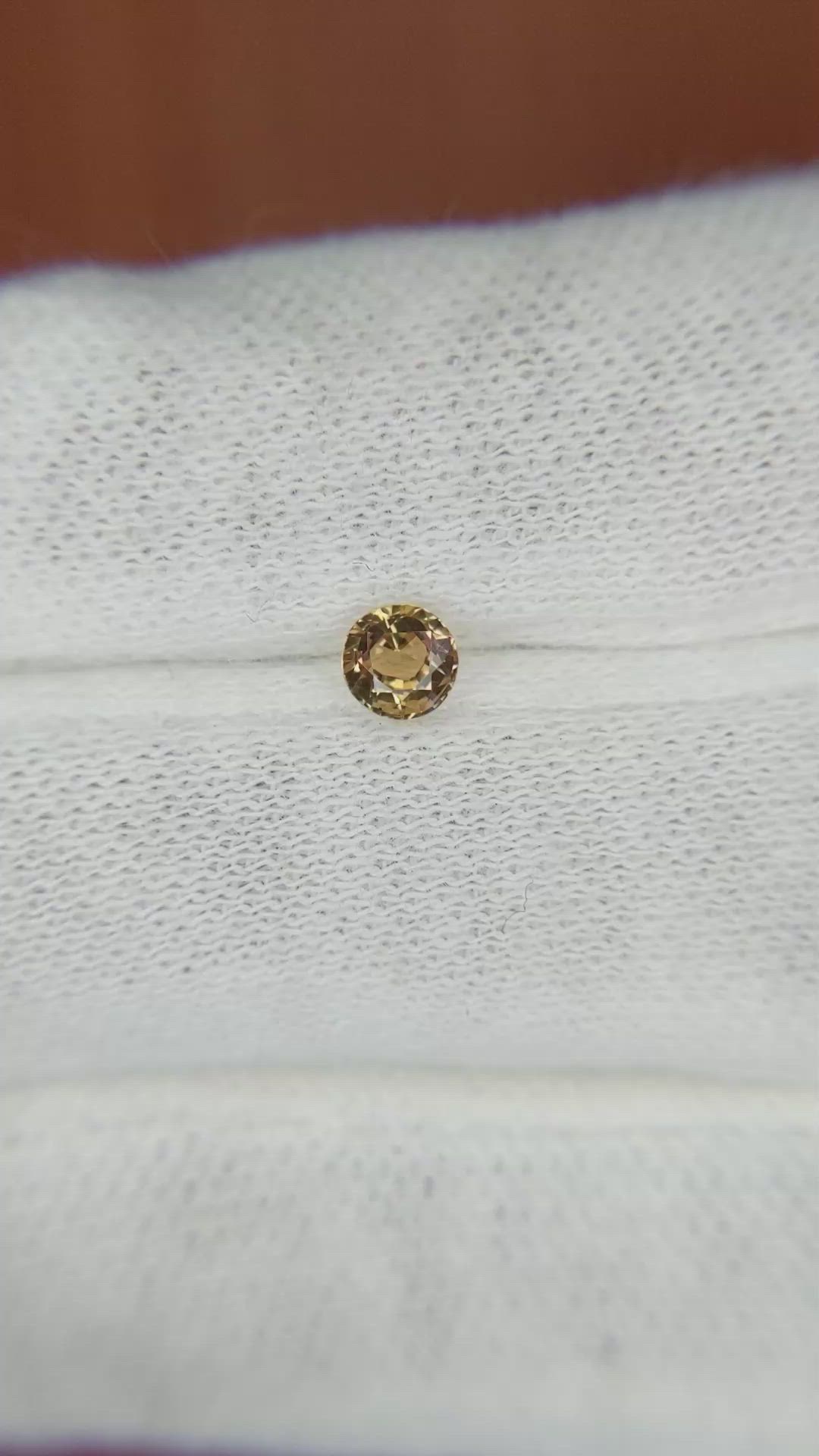 0.37 Ct. Greenish Brown Sapphire from Madagascar Size Video