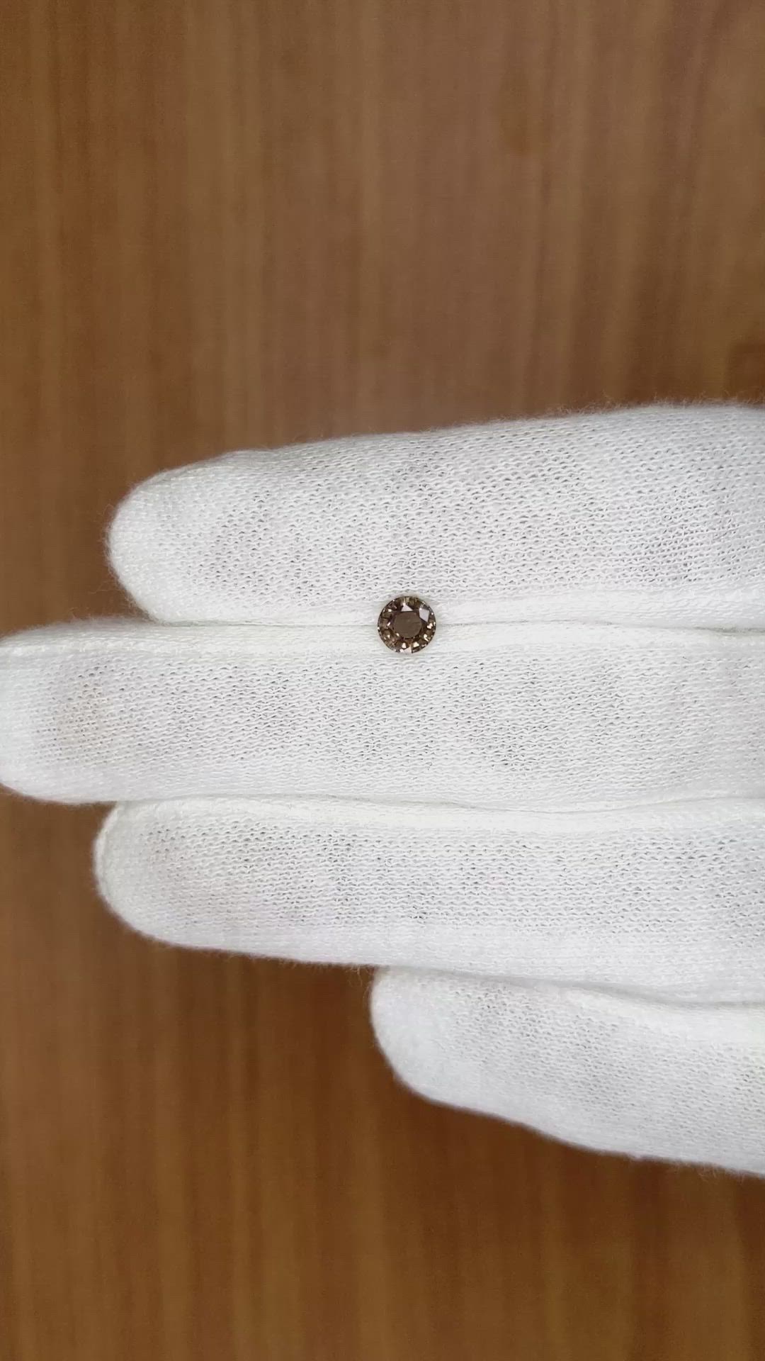 0.56 Ct. Brown Sapphire from Madagascar Size Video