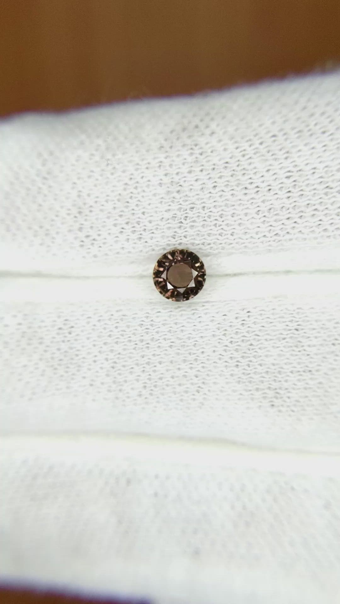 0.56 Ct. Brown Sapphire from Madagascar Size Video