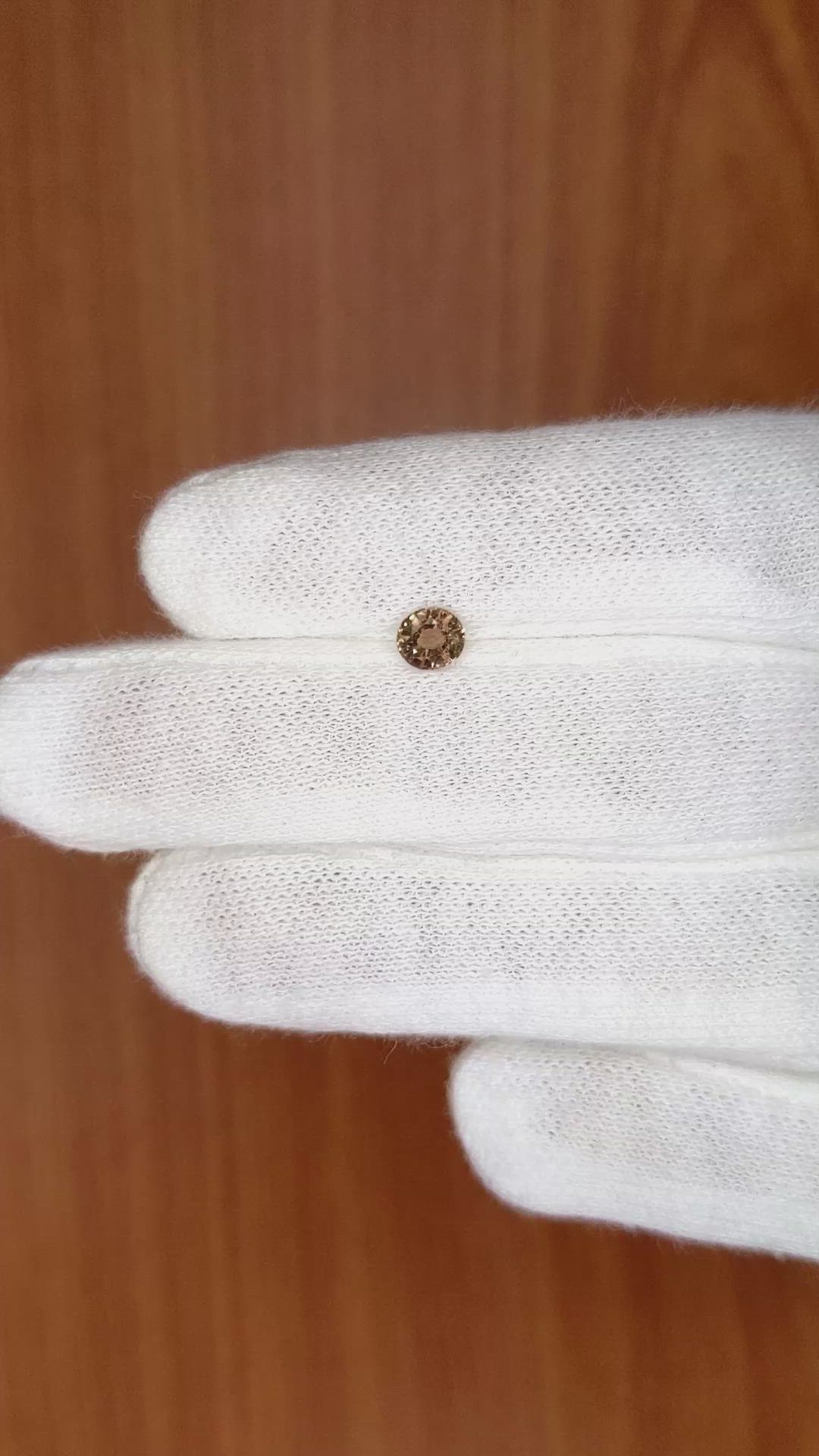 0.48 Ct. Brown Sapphire from Madagascar Size Video