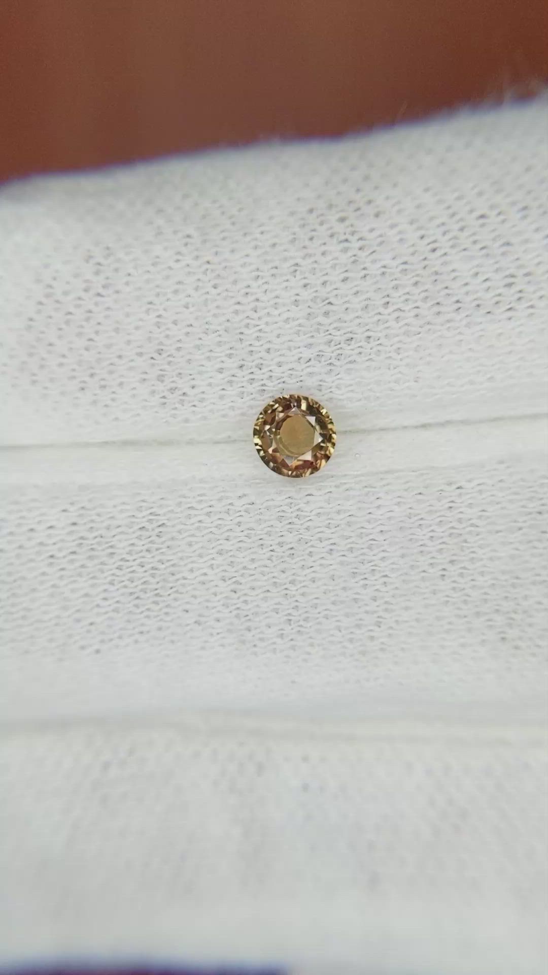 0.39 Ct. Greenish Brown Sapphire from Madagascar Size Video