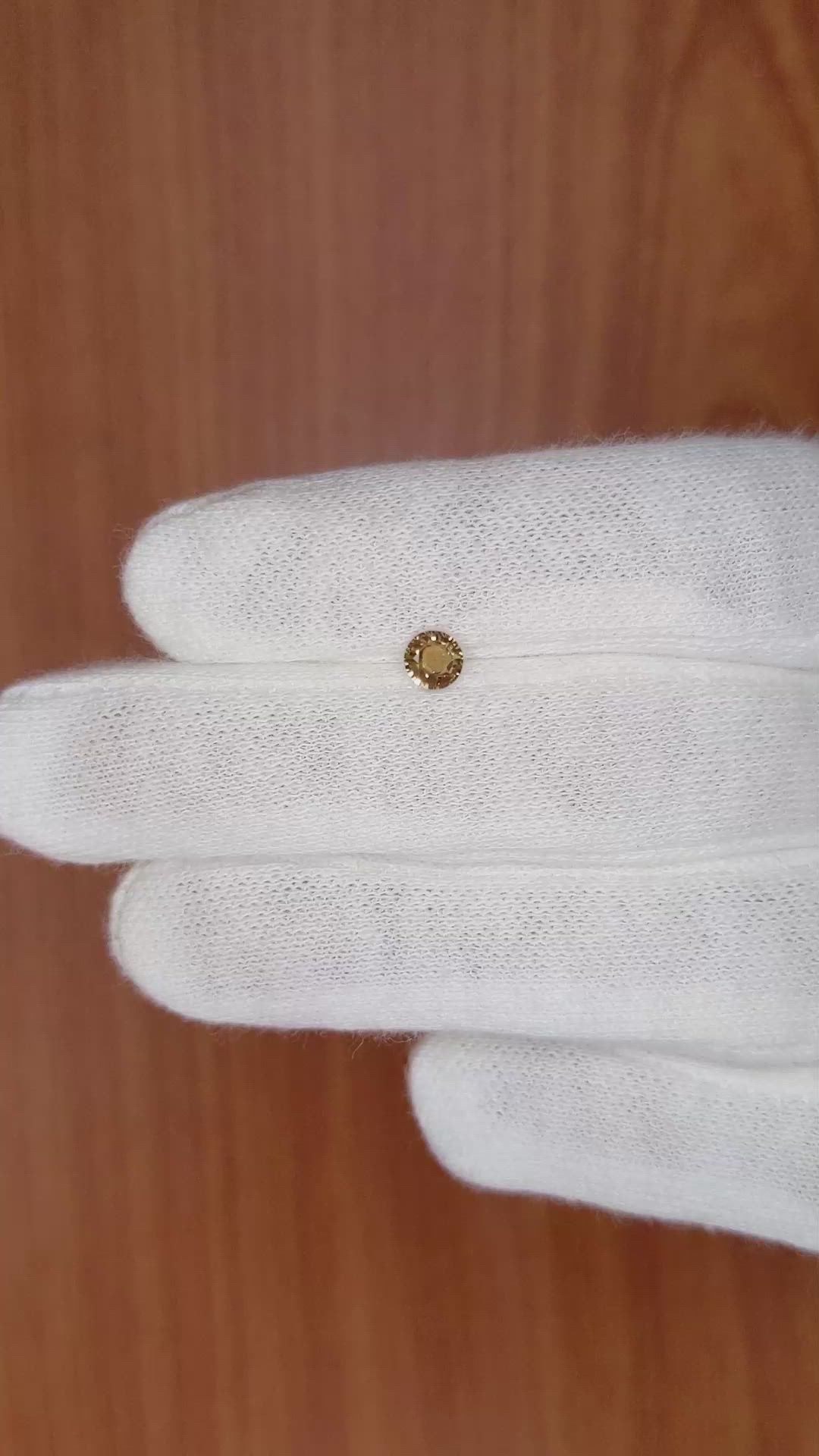 0.39 Ct. Greenish Brown Sapphire from Madagascar Size Video
