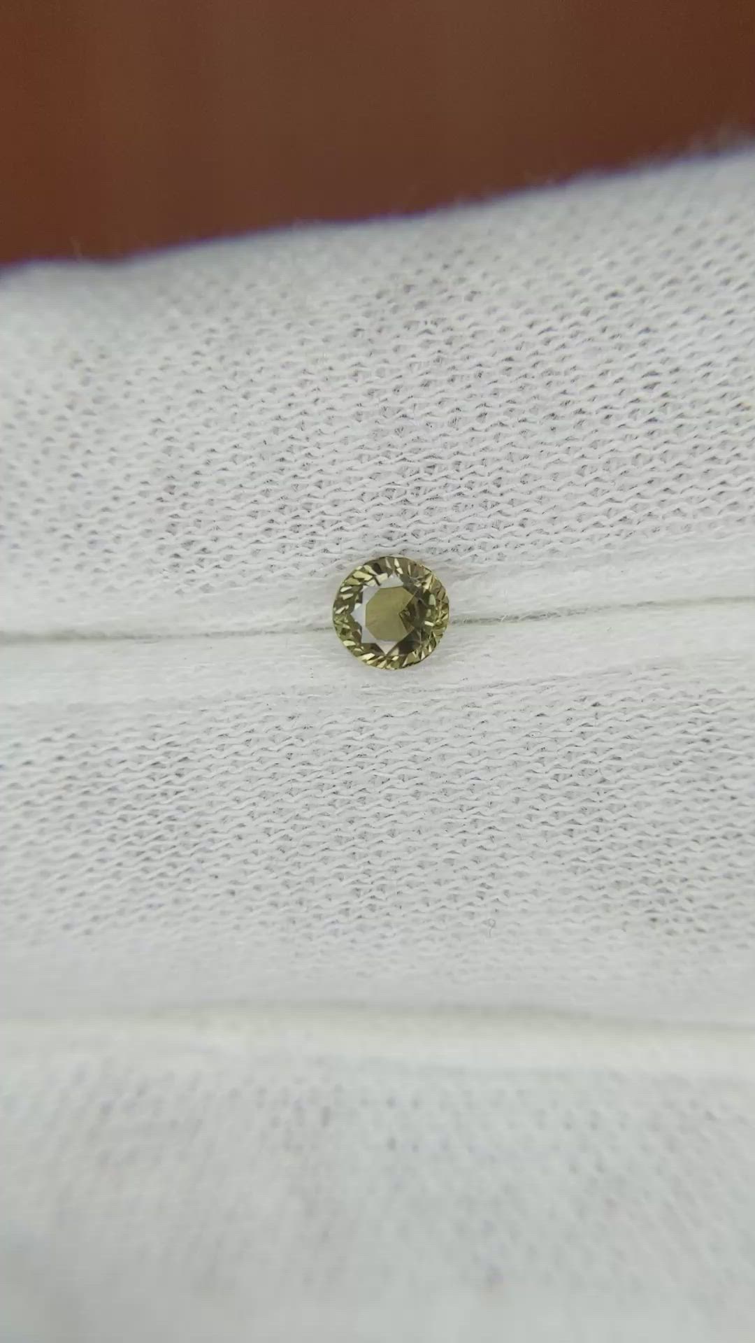 0.49 Ct. Greenish Yellow Sapphire from Madagascar Size Video