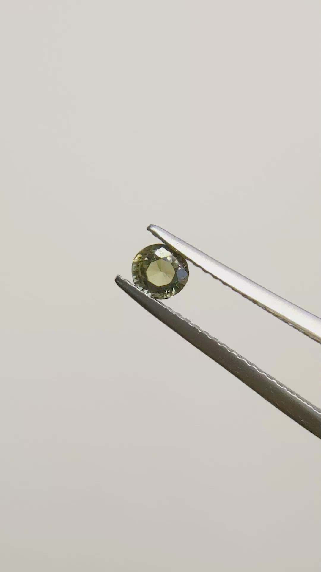 0.49 Ct. Greenish Yellow Sapphire from Madagascar Size Video