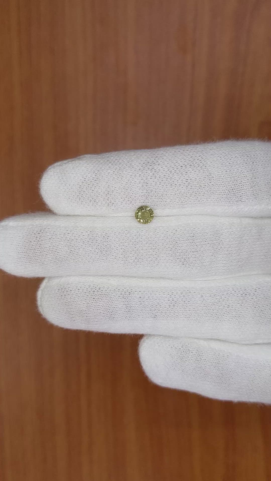 0.49 Ct. Greenish Yellow Sapphire from Madagascar Size Video