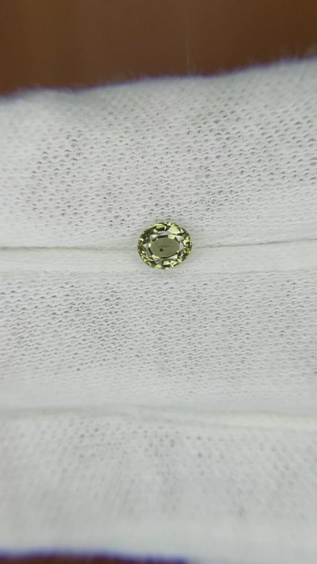 0.46 Ct. Yellowish Green Sapphire from Madagascar Size Video