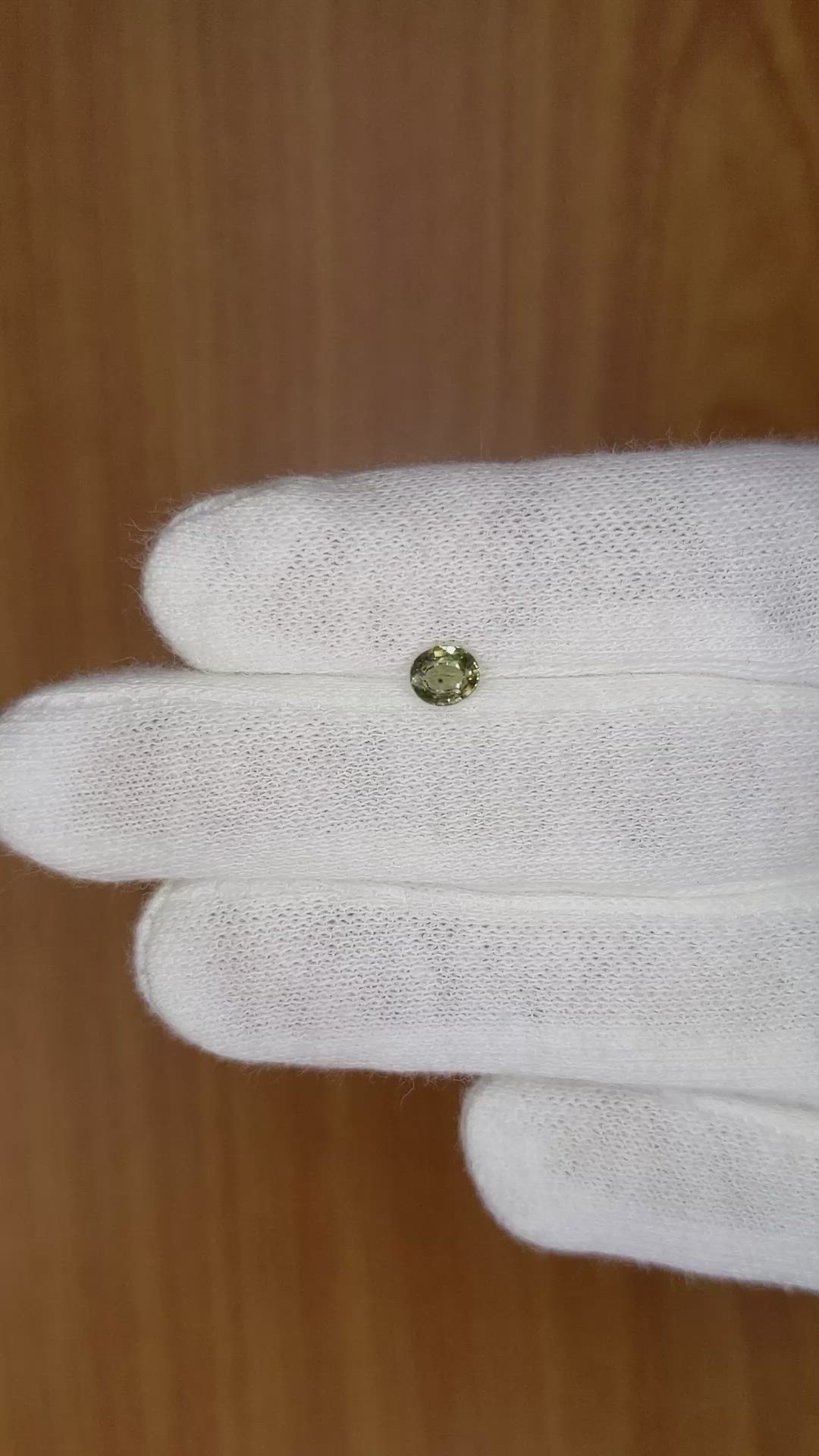 0.46 Ct. Yellowish Green Sapphire from Madagascar Size Video