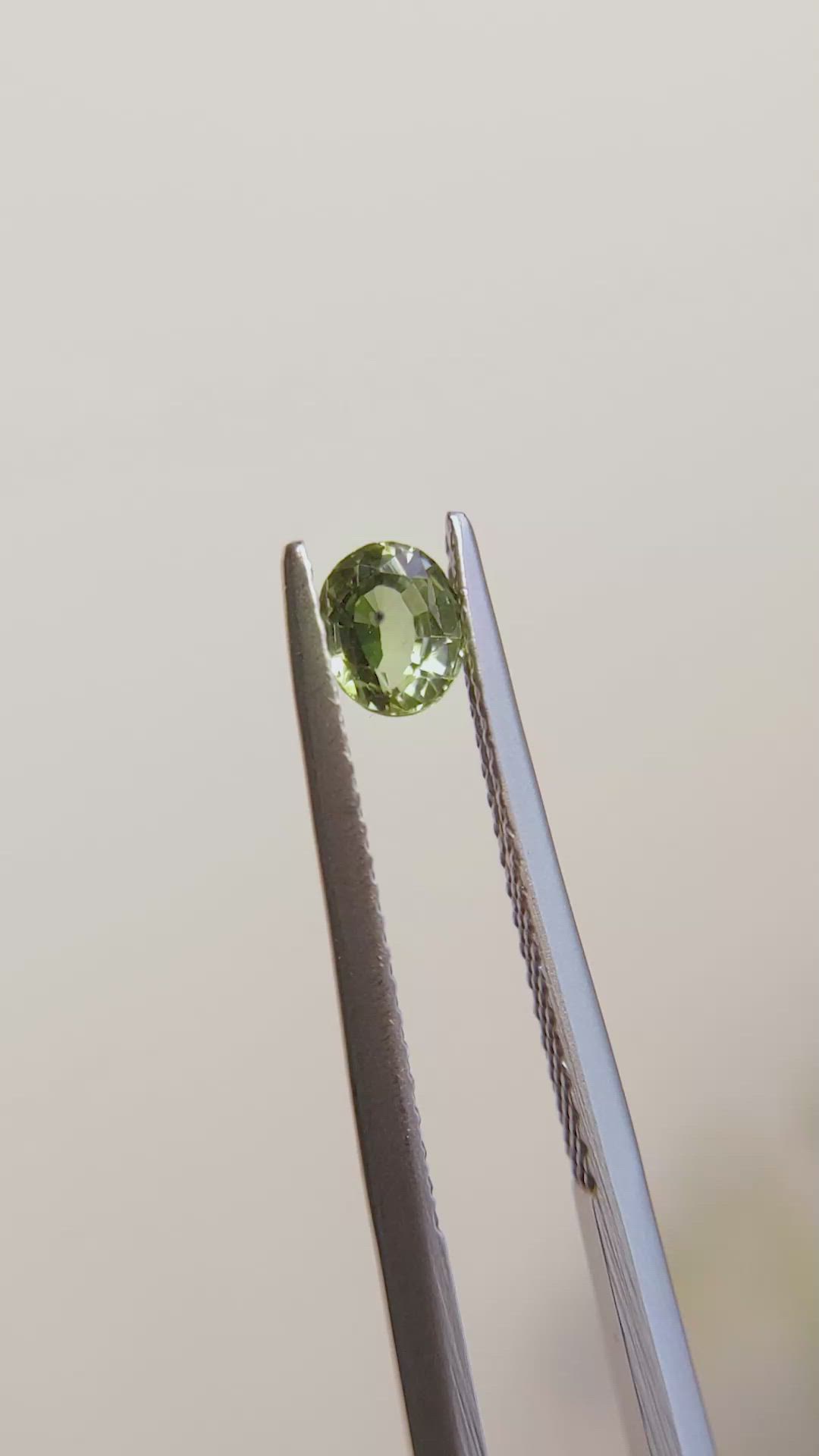 0.46 Ct. Yellowish Green Sapphire from Madagascar Size Video