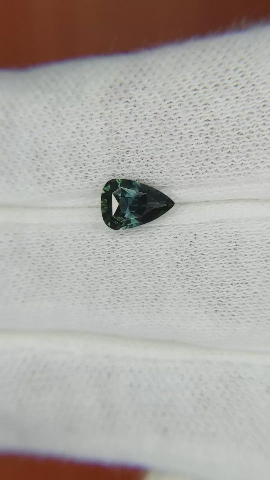 0.98 Ct. Bluish Green Sapphire from Madagascar Size Video