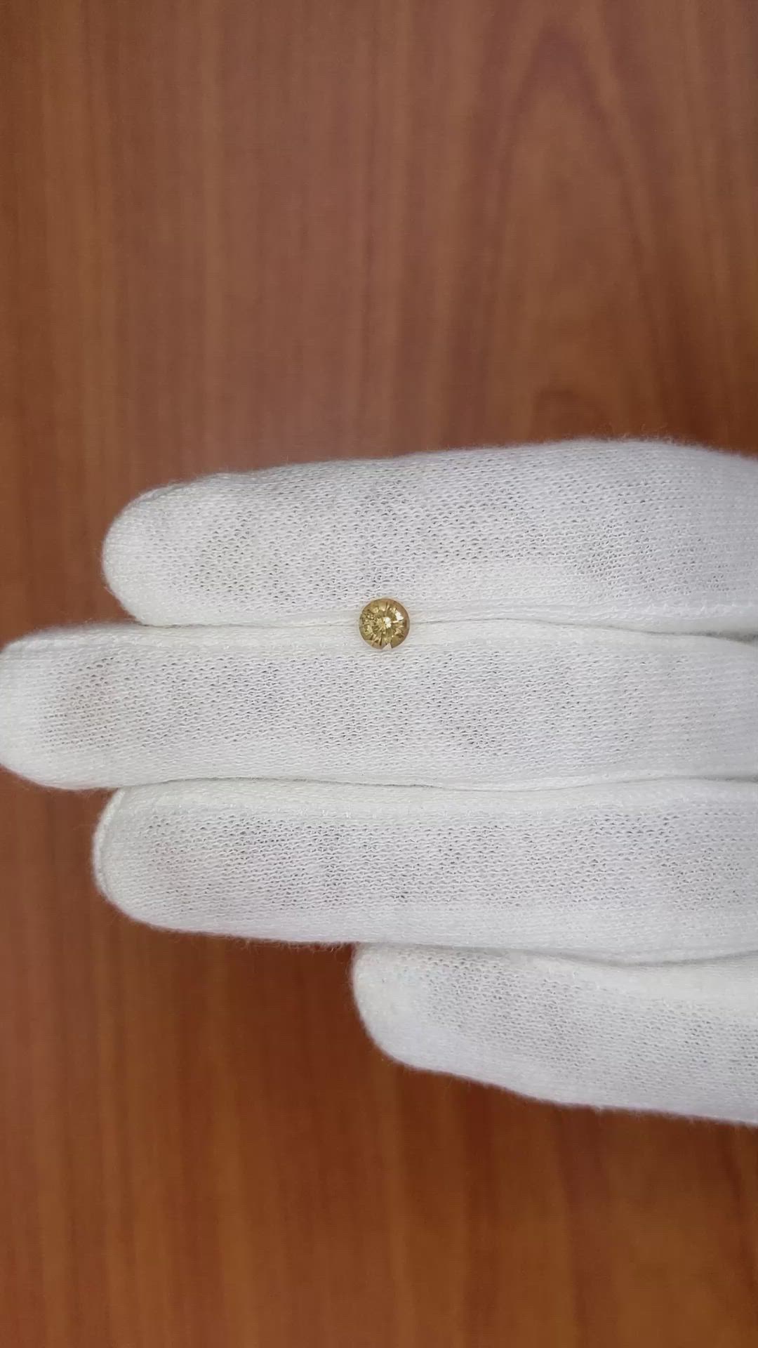 0.53 Ct. Yellowish Brown Sapphire from Madagascar Size Video