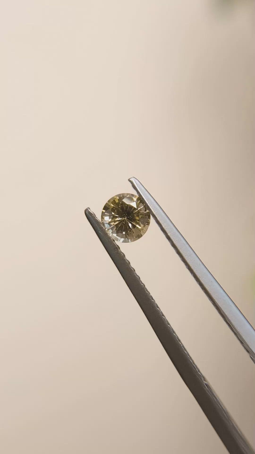 0.53 Ct. Yellowish Brown Sapphire from Madagascar Size Video